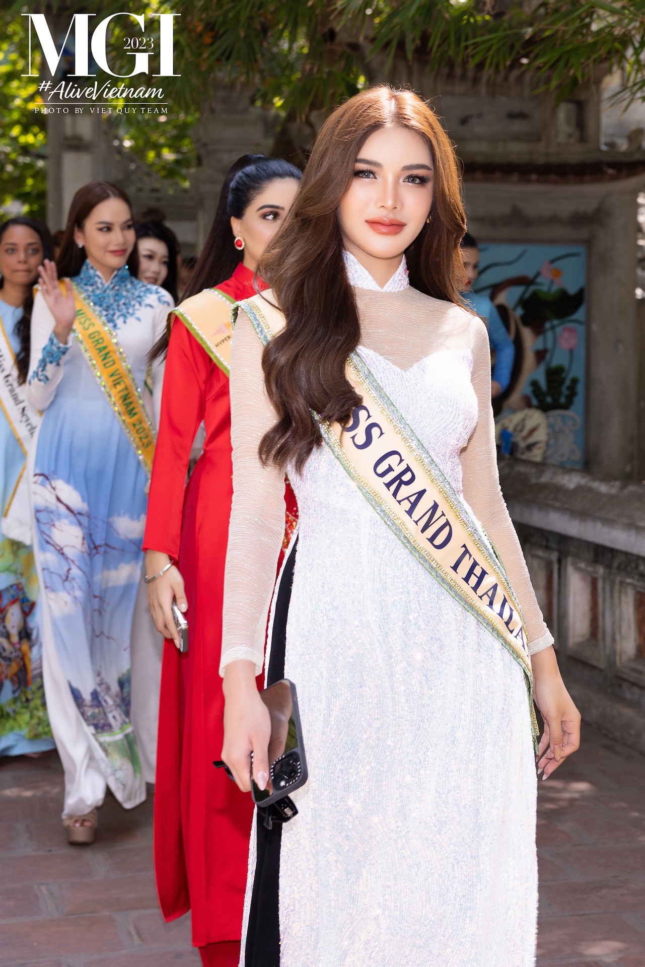 Dàn mỹ nhân 'Miss Grand International 2023' khoe sắc với áo dài Việt Nam   - Ảnh 11.