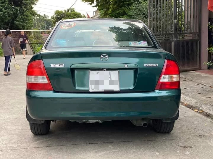 70 triệu cho Mazda 323 - đối thủ một thời của Toyota Corolla Altis - Ảnh 2. 70 triệu cho Mazda 323 - đối thủ một thời của Toyota Corolla Altis - Ảnh 2.