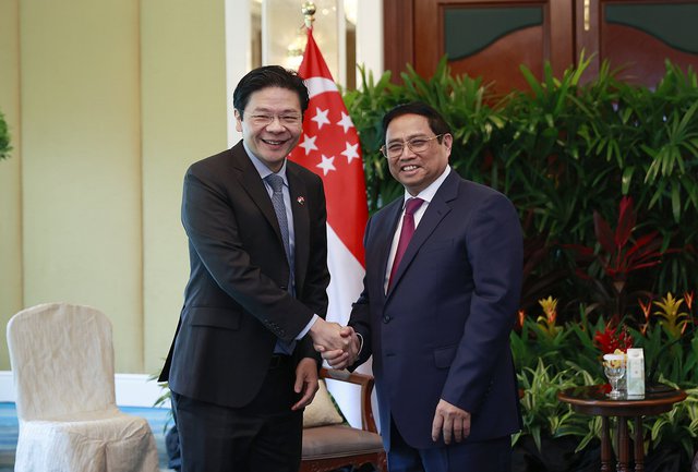 Thủ tướng gặp Phó thủ tướng Singapore- người được xem kế nhiệm Thủ tướng Lý Hiển Long - Ảnh 1.
