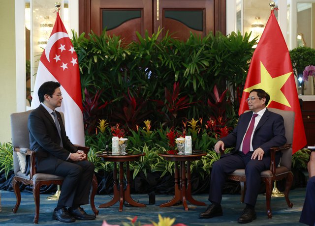 Thủ tướng gặp Phó thủ tướng Singapore- người được xem kế nhiệm Thủ tướng Lý Hiển Long - Ảnh 2.