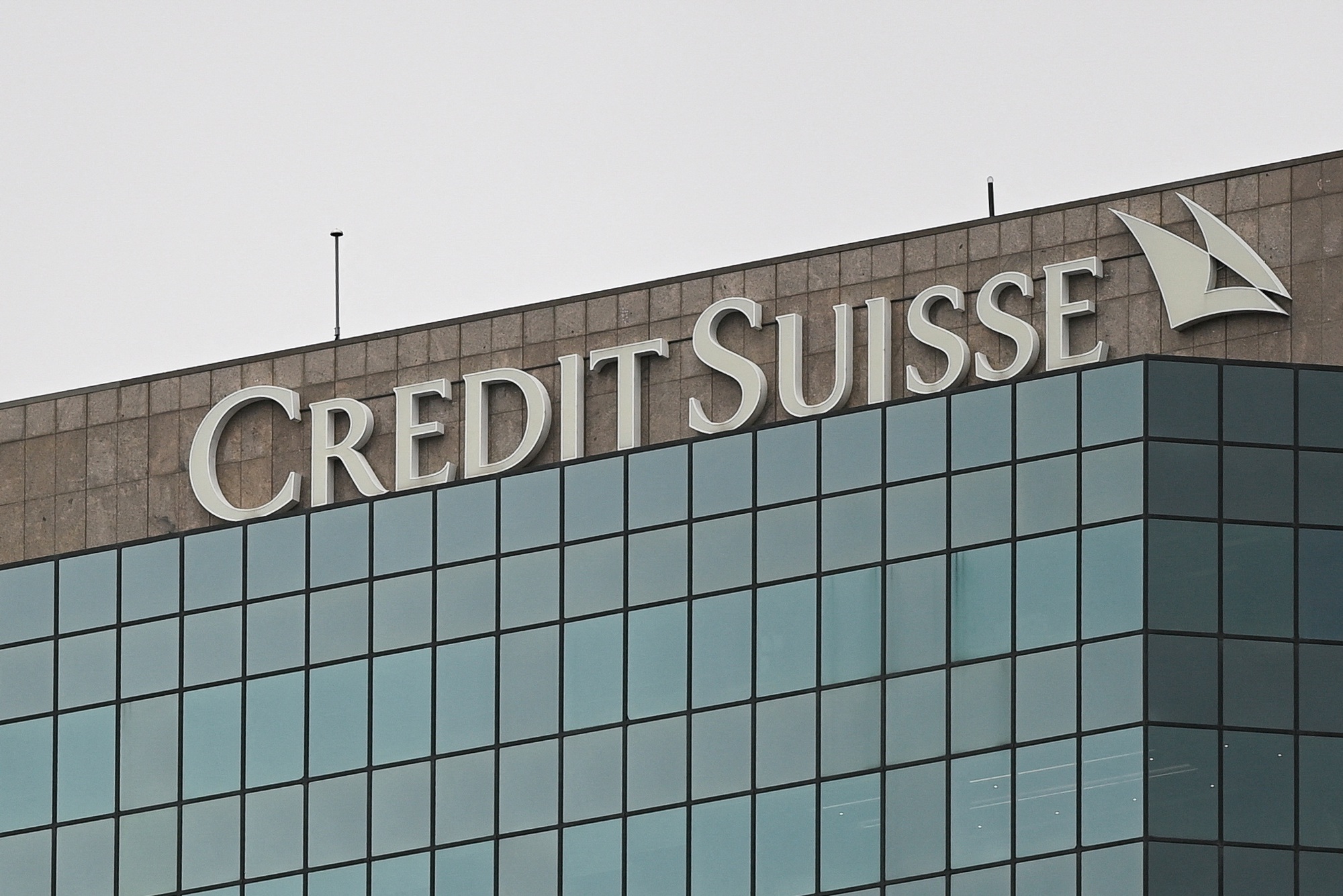 UBS đồng ý mua lại Credit Suisse - Ảnh 1.