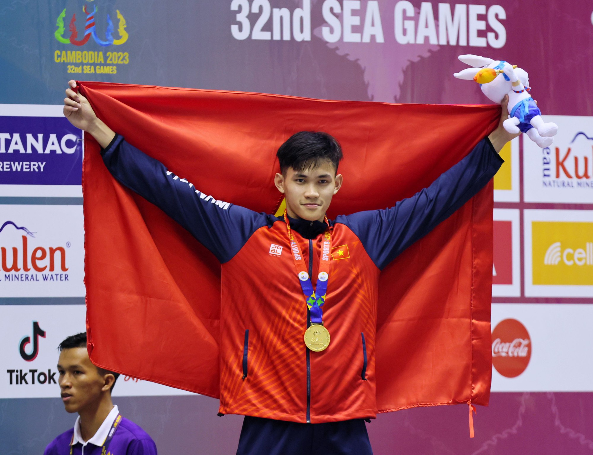 Nhà vô địch SEA Games 32 dành tặng huy chương vàng cho bà nội quá cố - Ảnh 1.
