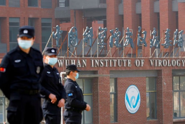 Chính quyền Tổng thống Biden xúc tiến cấm tài trợ Viện Virus học Vũ Hán - Ảnh 1.