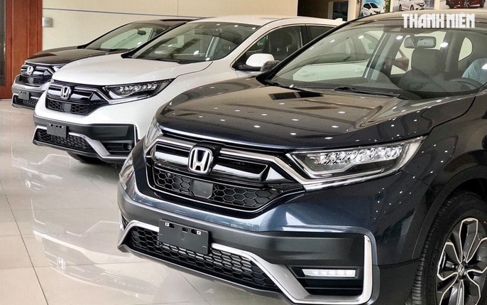 Hưởng ưu đãi kép, giá lăn bánh Honda CR-V giảm 200 triệu đồng - Ảnh 2.
