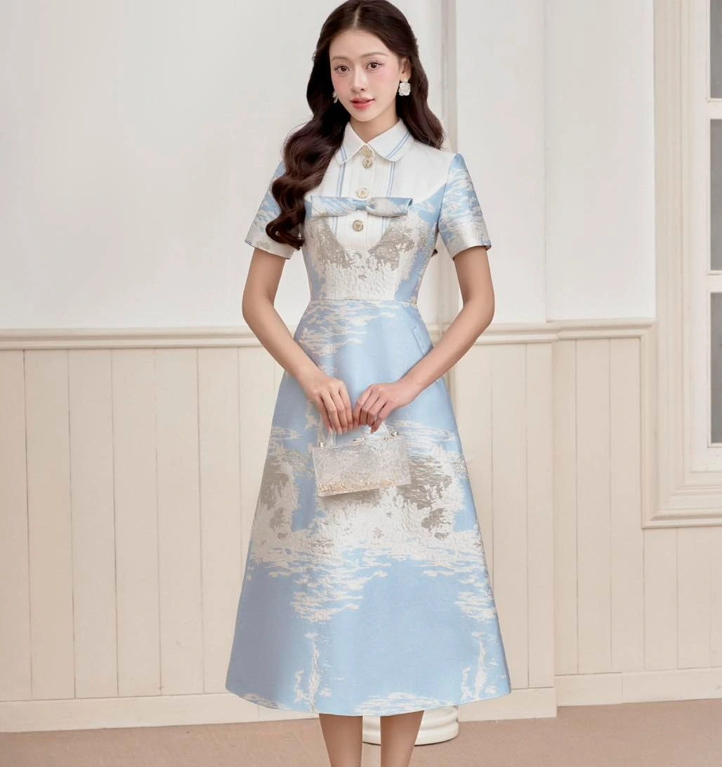 Vestidos camisa estilo 'bolso', simples, porém elegantes, para o escritório - Foto 2. ‘Bỏ túi’ những kiểu đầm sơ mi đơn giản mà sang trọng nơi công sở- Ảnh 2.