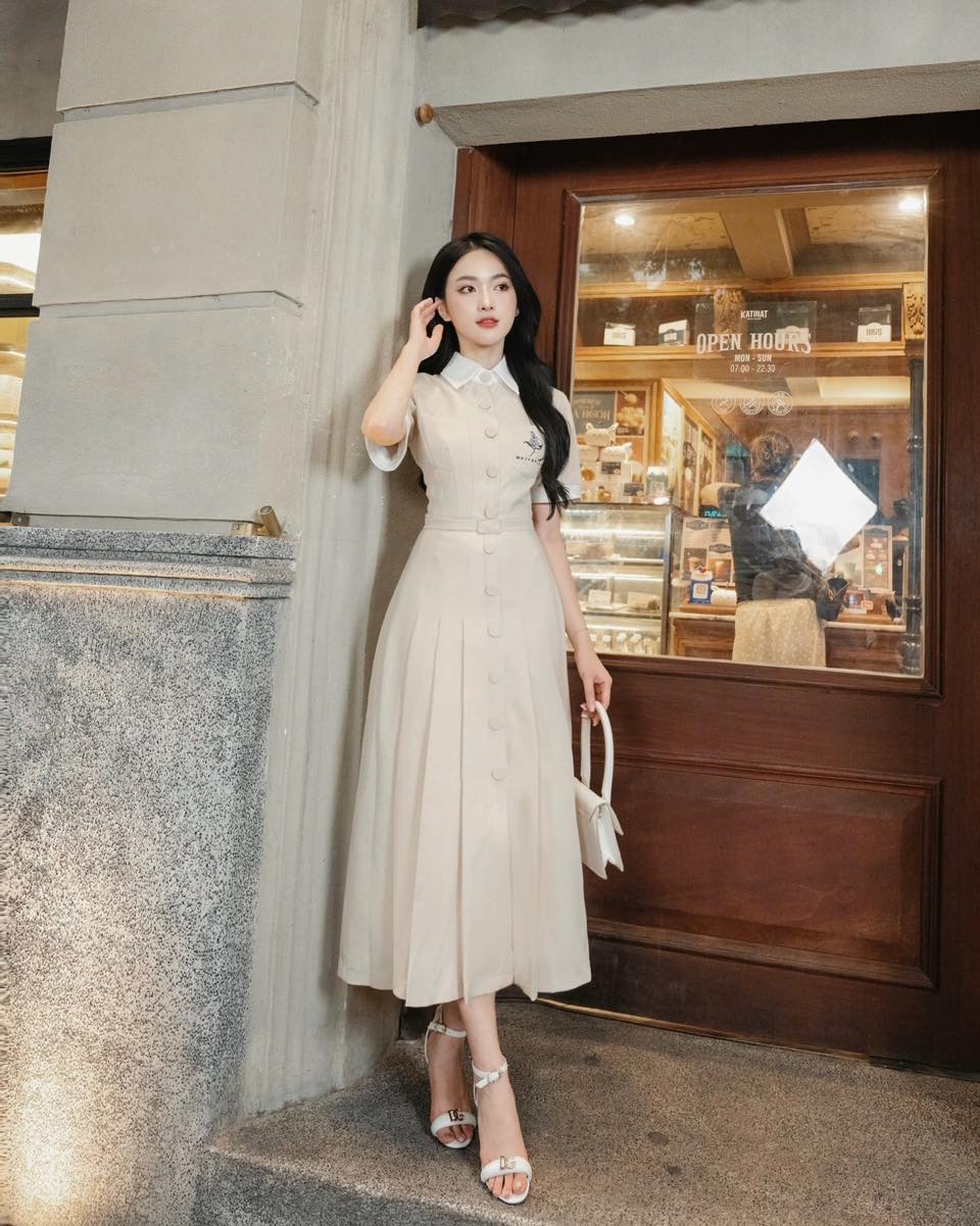 Estilos de vestidos camisa simples, porém elegantes, com bolsos para o escritório - Foto 5. ‘Bỏ túi’ những kiểu đầm sơ mi đơn giản mà sang trọng nơi công sở- Ảnh 5.
