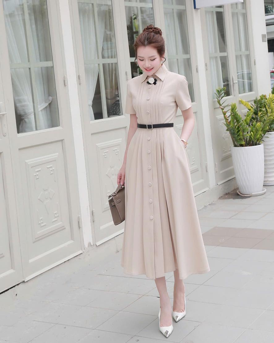 Vestidos camisa estilo 'bolso', simples, porém elegantes, para o escritório - Foto 1. ‘Bỏ túi’ những kiểu đầm sơ mi đơn giản mà sang trọng nơi công sở- Ảnh 1.