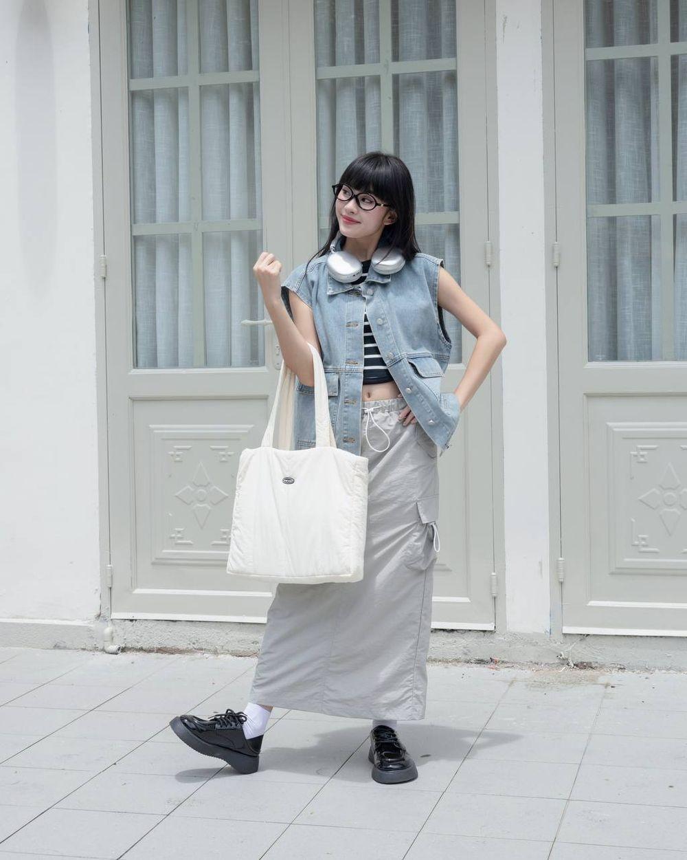 « Équilibrer » tous les styles, du sportif à l'élégant, avec un gilet - Photo 2. 'Cân' mọi phong cách, từ năng động đến thanh lịch với áo gile- Ảnh 2.