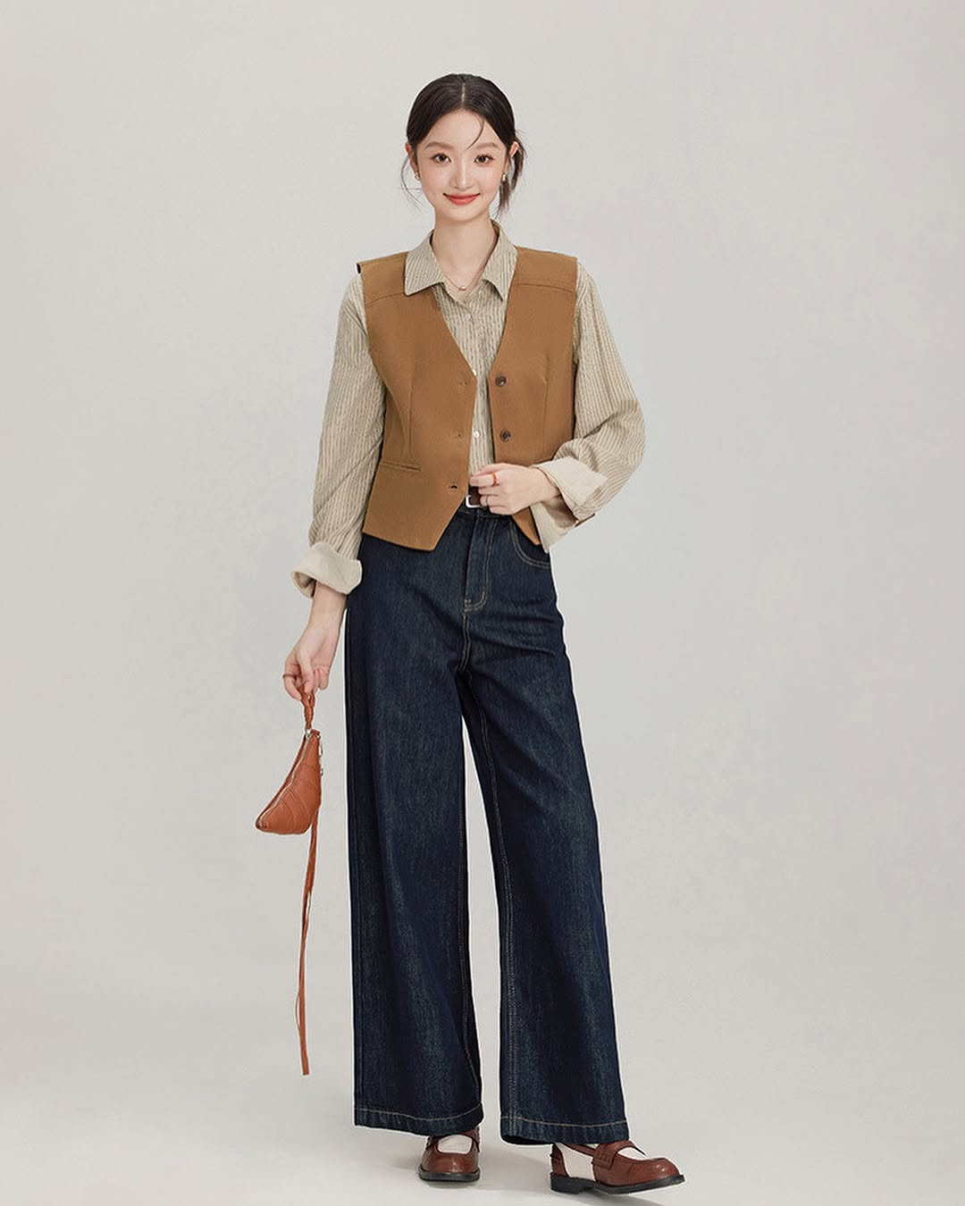 « Équilibrer » tous les styles, du sportif à l'élégant, avec un gilet - Photo 5. 'Cân' mọi phong cách, từ năng động đến thanh lịch với áo gile- Ảnh 5.