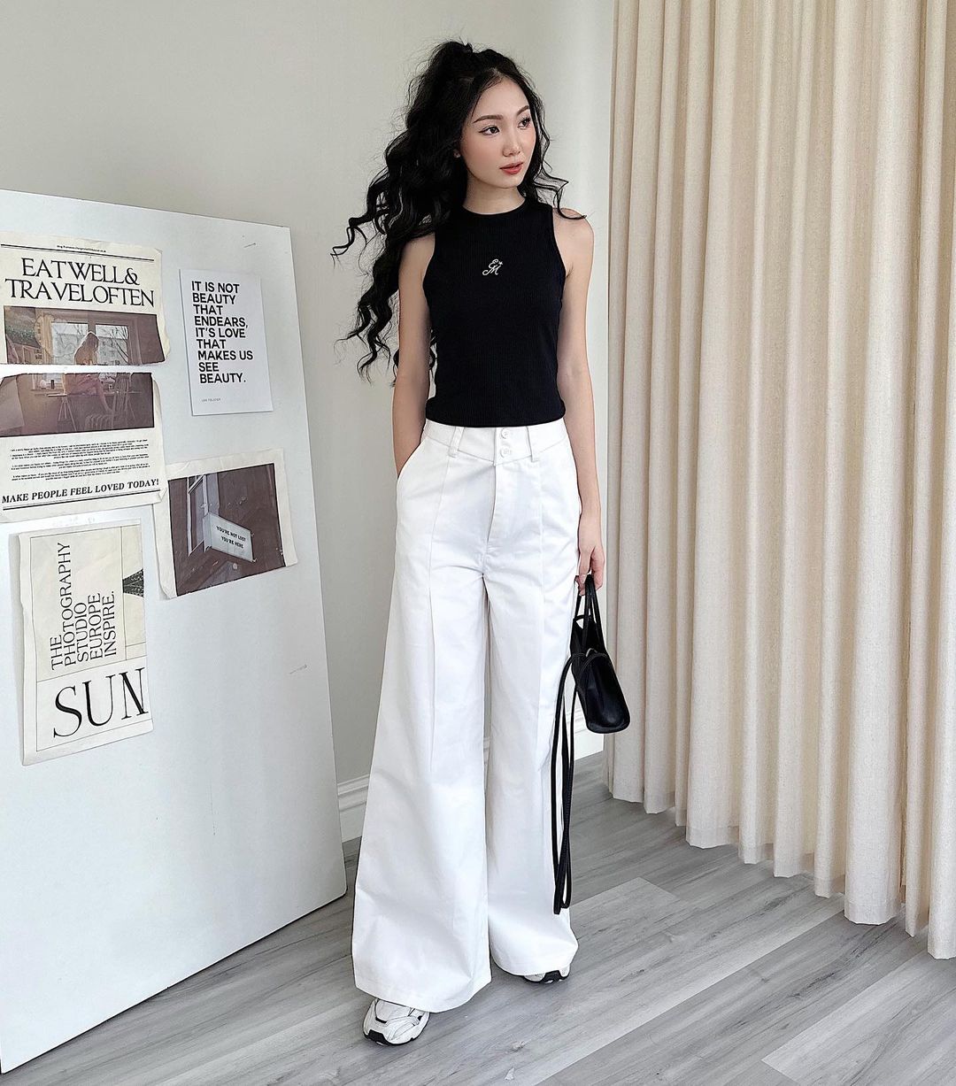 Celana putih tak boleh dilewatkan dalam lemari pakaian kantor yang trendi - Foto 6. Tủ đồ công sở thời thượng không thể vắng bóng quần trắng- Ảnh 6.