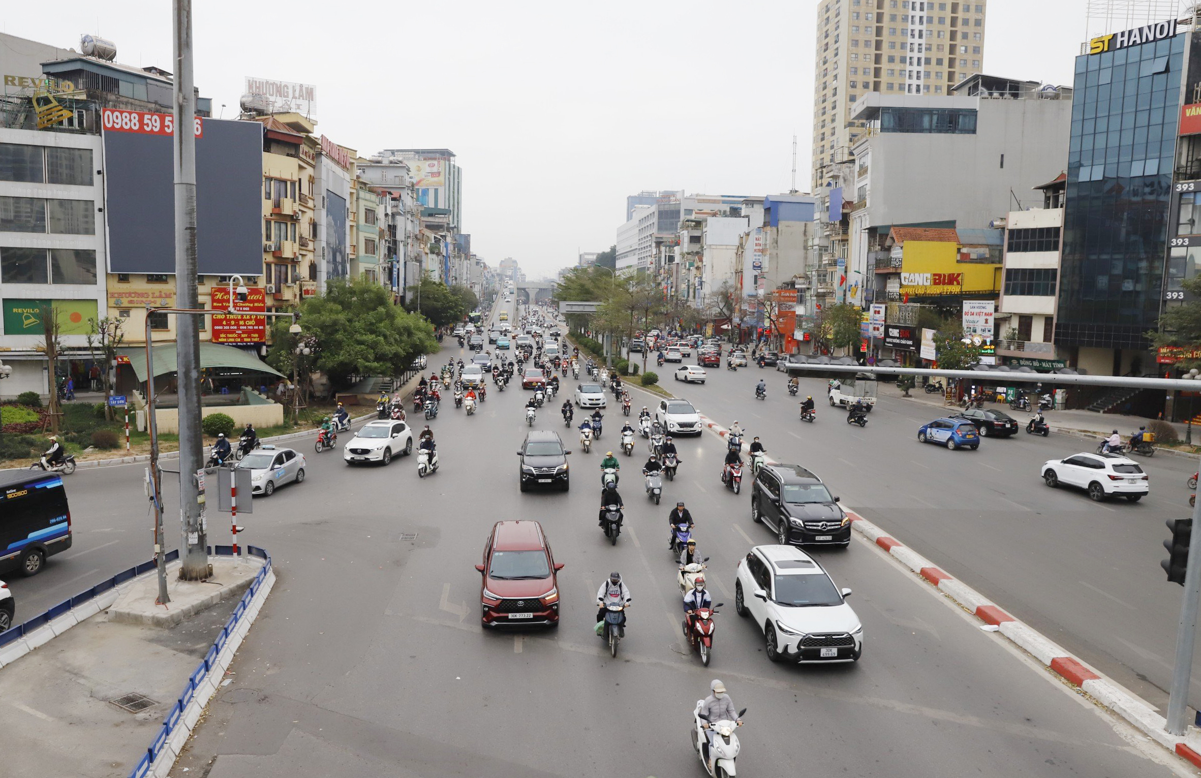 Đường phố Hà Nội thông thoáng bất ngờ sau kỳ nghỉ tết Nguyên đán- Ảnh 6.