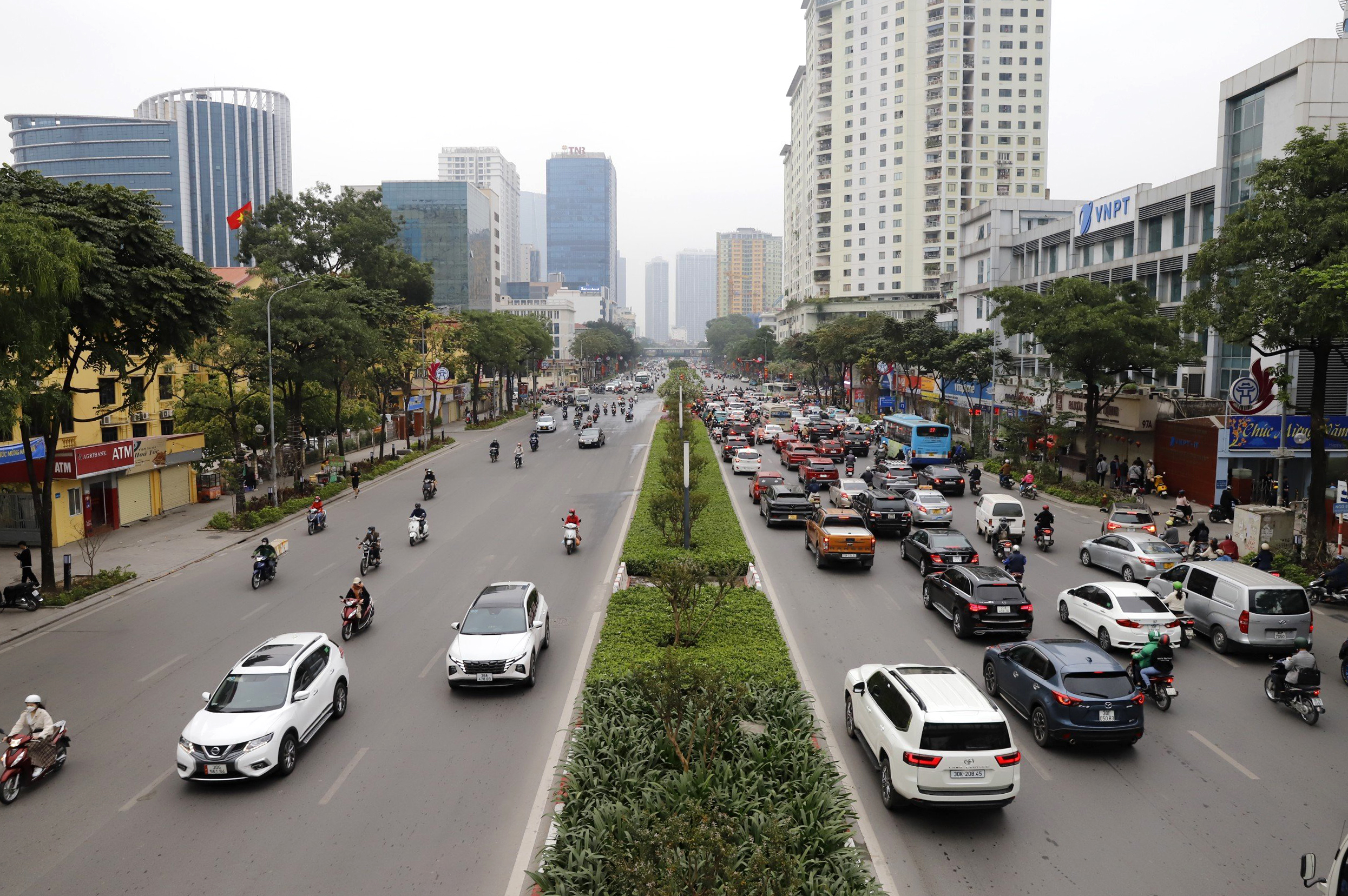 Đường phố Hà Nội thông thoáng bất ngờ sau kỳ nghỉ tết Nguyên đán- Ảnh 5.