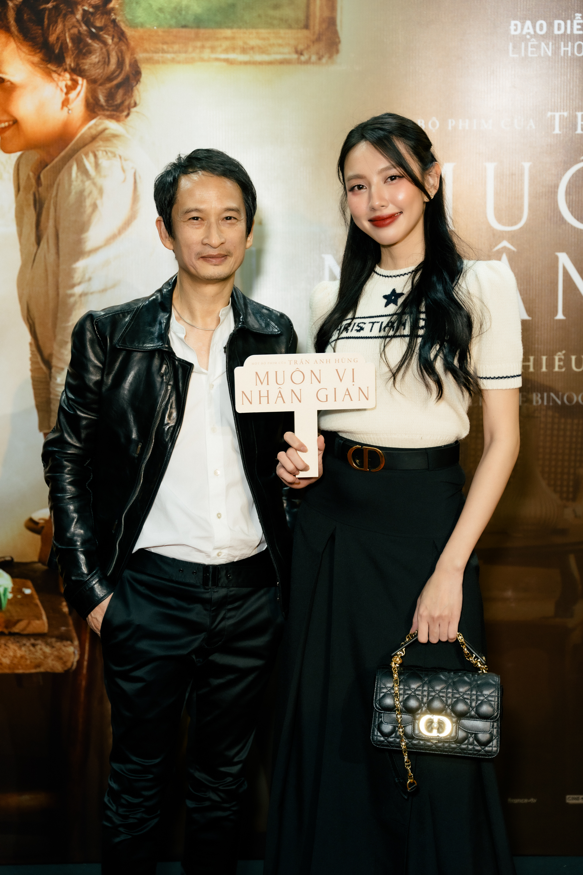 Trần Anh Hùng sánh đôi cùng vợ ra mắt phim mới tại TP.HCM- Ảnh 7.