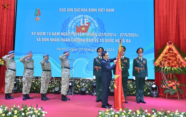 Cục Gìn giữ hòa bình Việt Nam đón nhận Huân chương Bảo vệ Tổ quốc hạng ba- Ảnh 1.