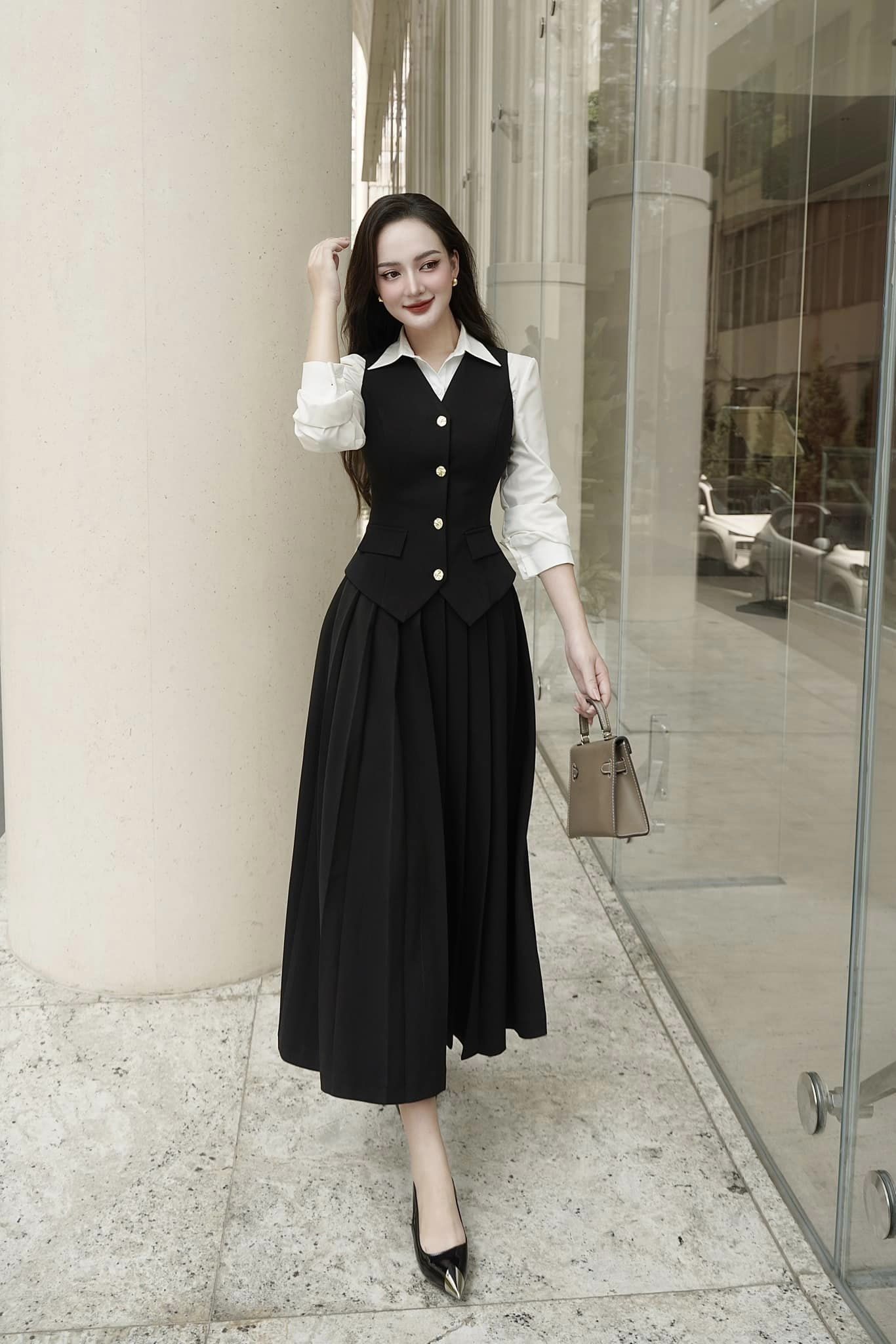 Yeleklerle şık ve modaya uygun anları koruyun - Fotoğraf 3. Lưu giữ những khoảnh khắc thanh lịch và thời thượng với áo gile- Ảnh 3.