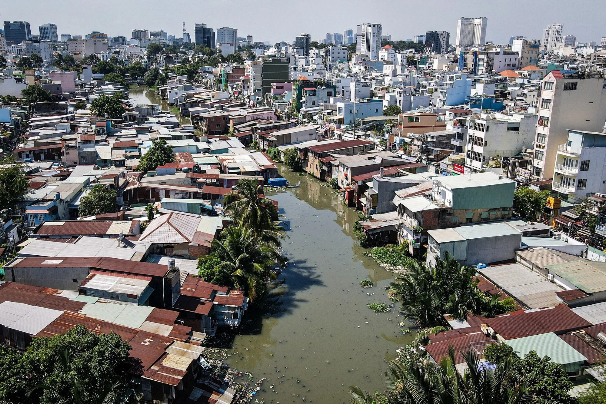 Người dân có nhà ven kênh rạch phập phồng tiền bồi thường, chỗ ở mới sau di dời- Ảnh 1.