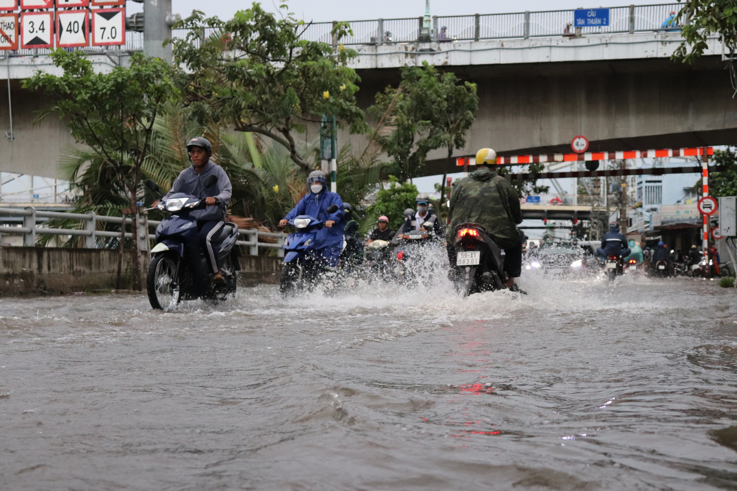 TP.HCM chi 375 tỉ giải cứu 'rốn ngập' Trần Xuân Soạn, người dân nói gì?- Ảnh 2.