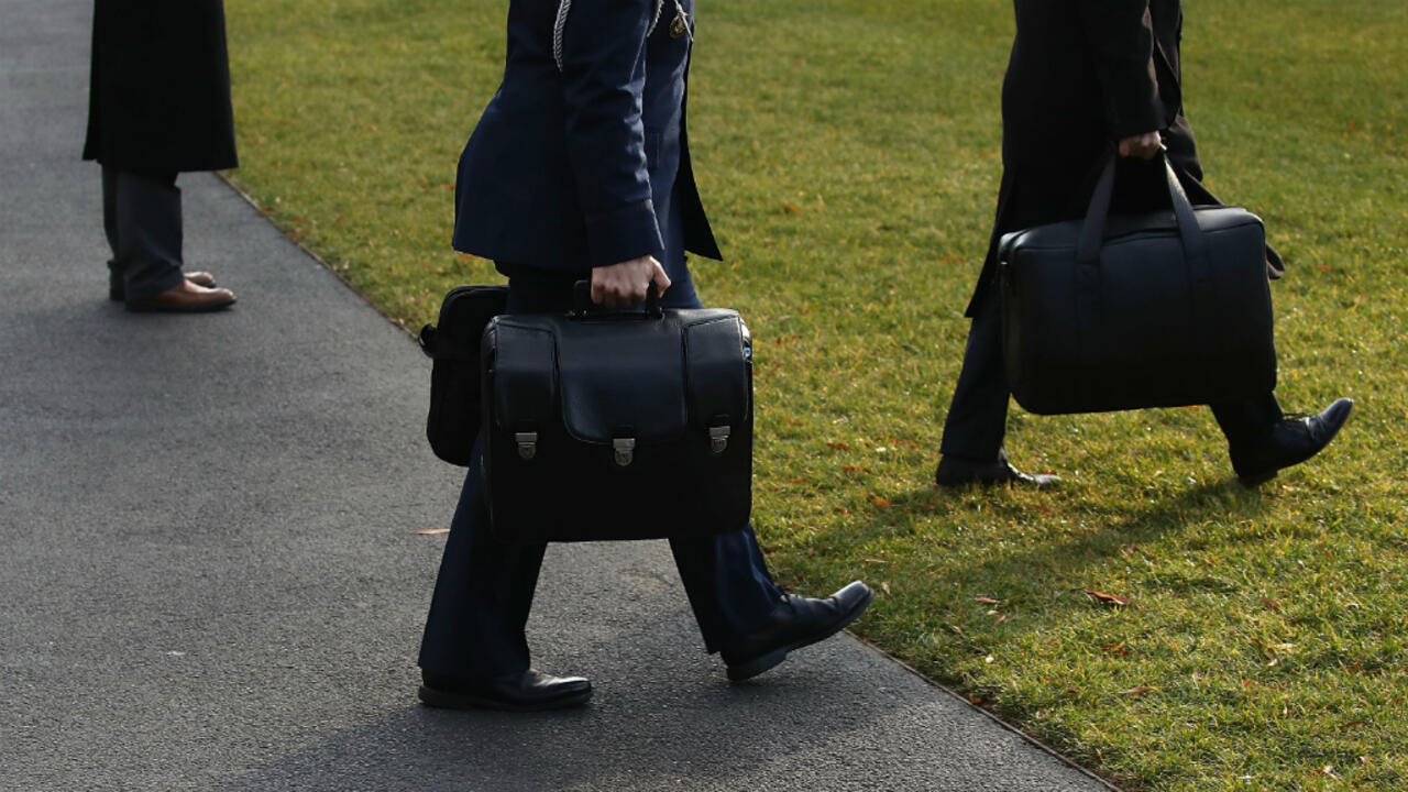 How will the nuclear suitcase be transferred from Mr. Biden to Mr. Trump? - Photo 2.