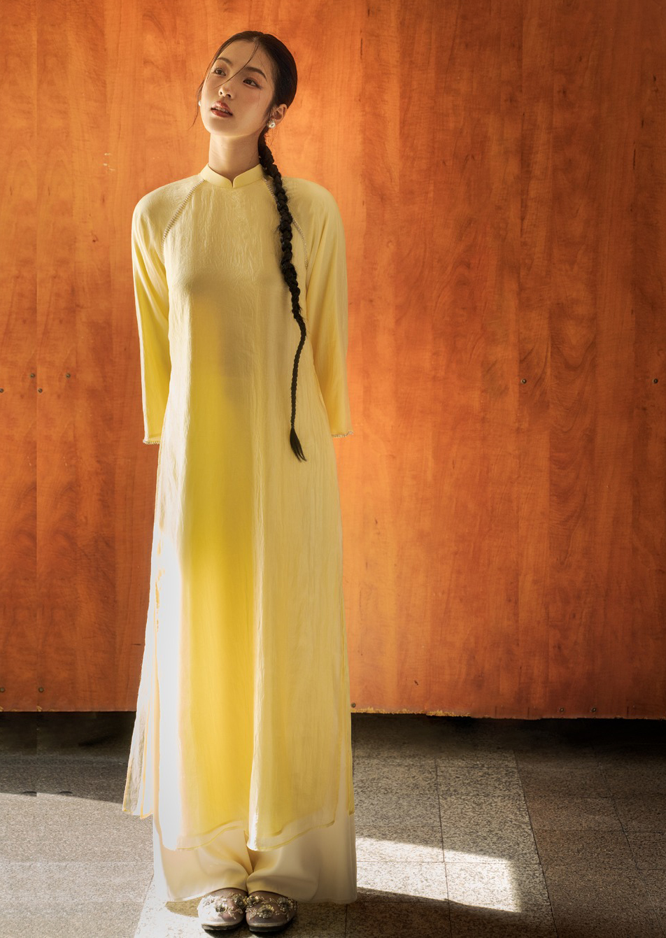 As cores exclusivas do Ao Dai são indispensáveis para o feriado do Tet - Foto 4. Những gam màu áo dài đặc sắc không thể thiếu cho ngày tết- Ảnh 4.