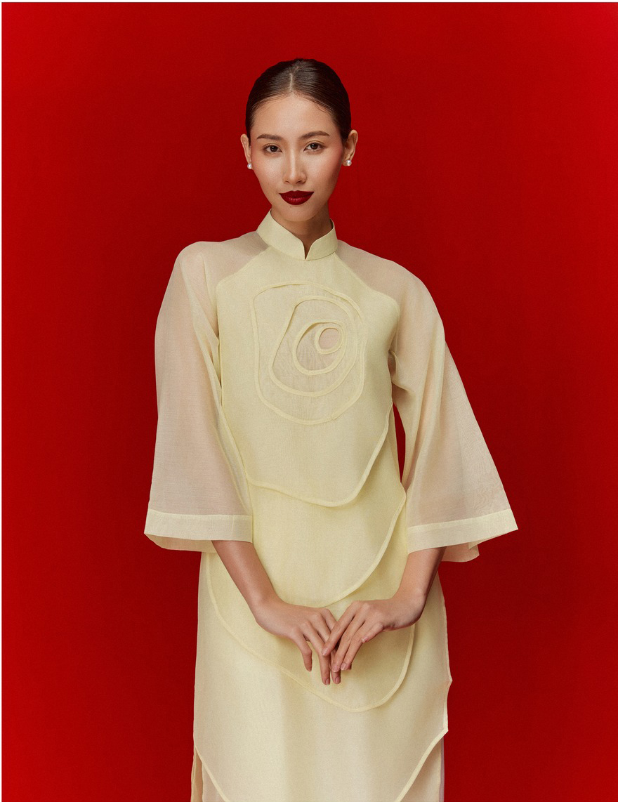 5 krásných a nejoblíbenějších návrhů Ao Dai pro lunární Nový rok - Foto 13. 5 mẫu áo dài đẹp xuất sắc, được ưa thích nhất mùa Tết Ất Tỵ- Ảnh 13.