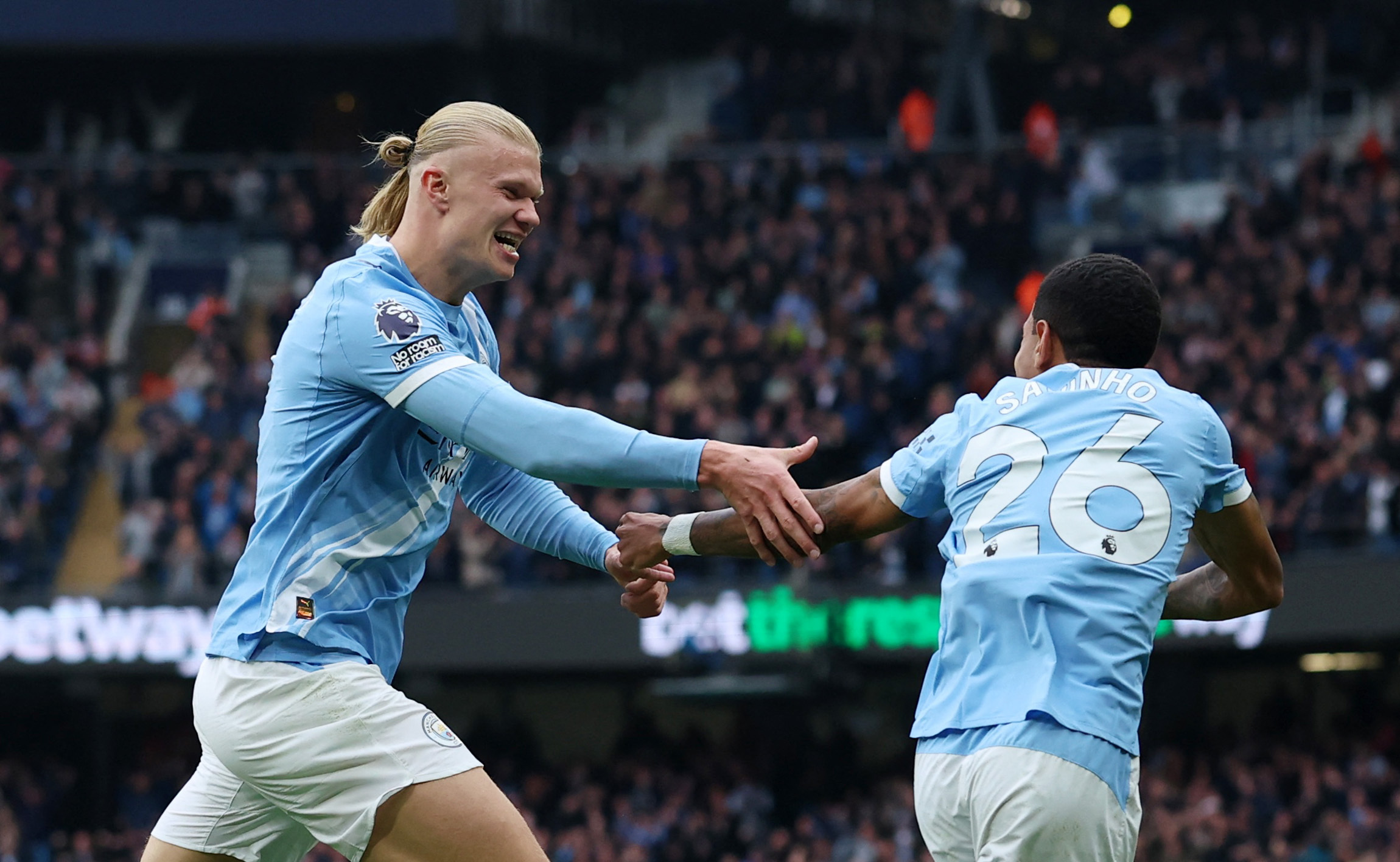 erling Haaland celebrating a goal for Manchester City against Everton