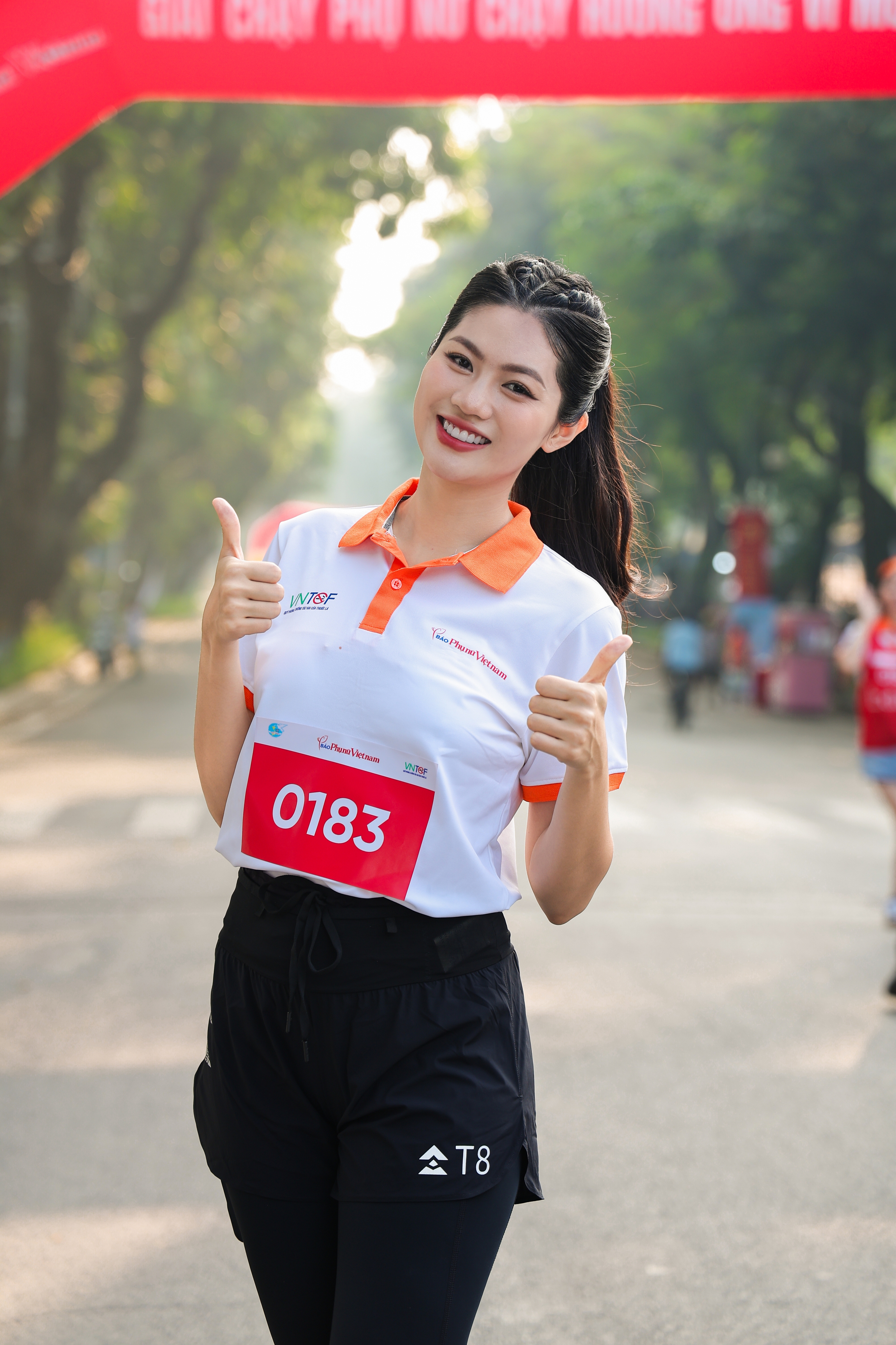 Hoa khôi Vũ Hương Giang tham gia giải chạy vì môi trường không thuốc lá - Ảnh 2.