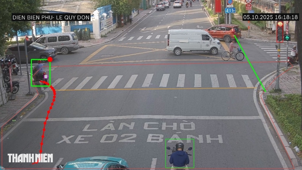 Camera AI của CSGT TP.HCM bắt lỗi hàng loạt xe máy vượt đèn đỏ ở trung tâm- Ảnh 4.