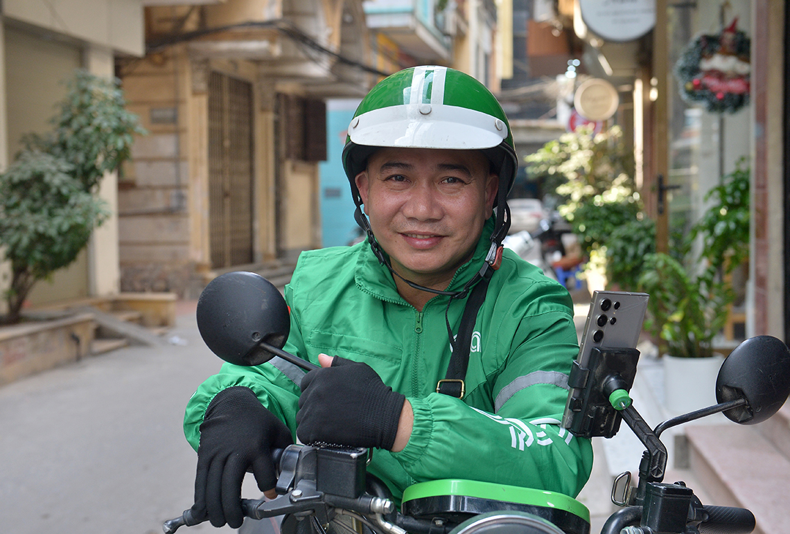 Tài xế GrabBike kể chuyện chạy xe mua nhà, gánh cả ước mơ của con - Ảnh 1.