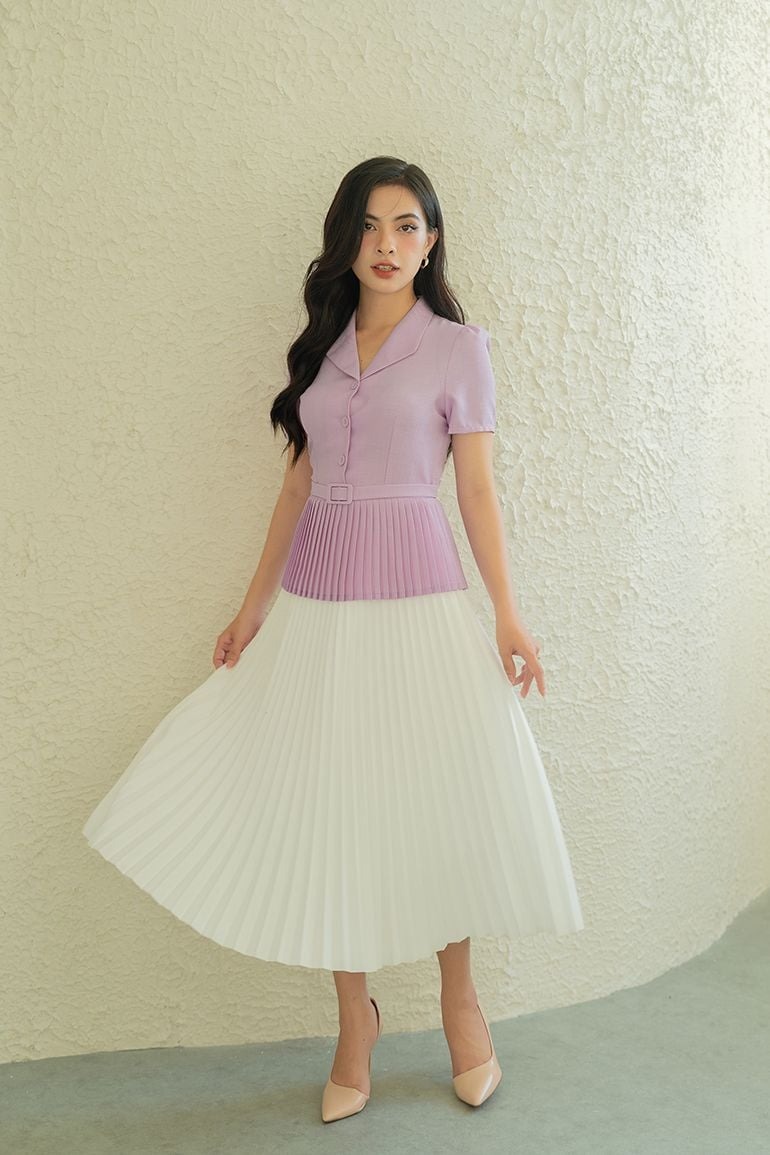 Bí mật đằng sau vẻ đẹp ‘gây thương nhớ’ của áo peplum - Ảnh 1.