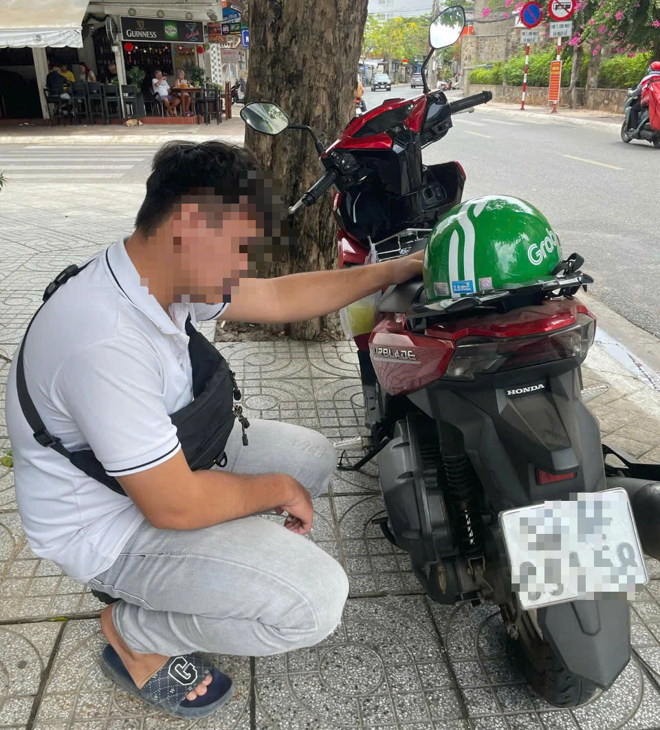Tài xế GrabBike trả lại tiền cho khách chuyển nhầm 71 ngàn đồng thành 71 triệu đồng - Ảnh 1.