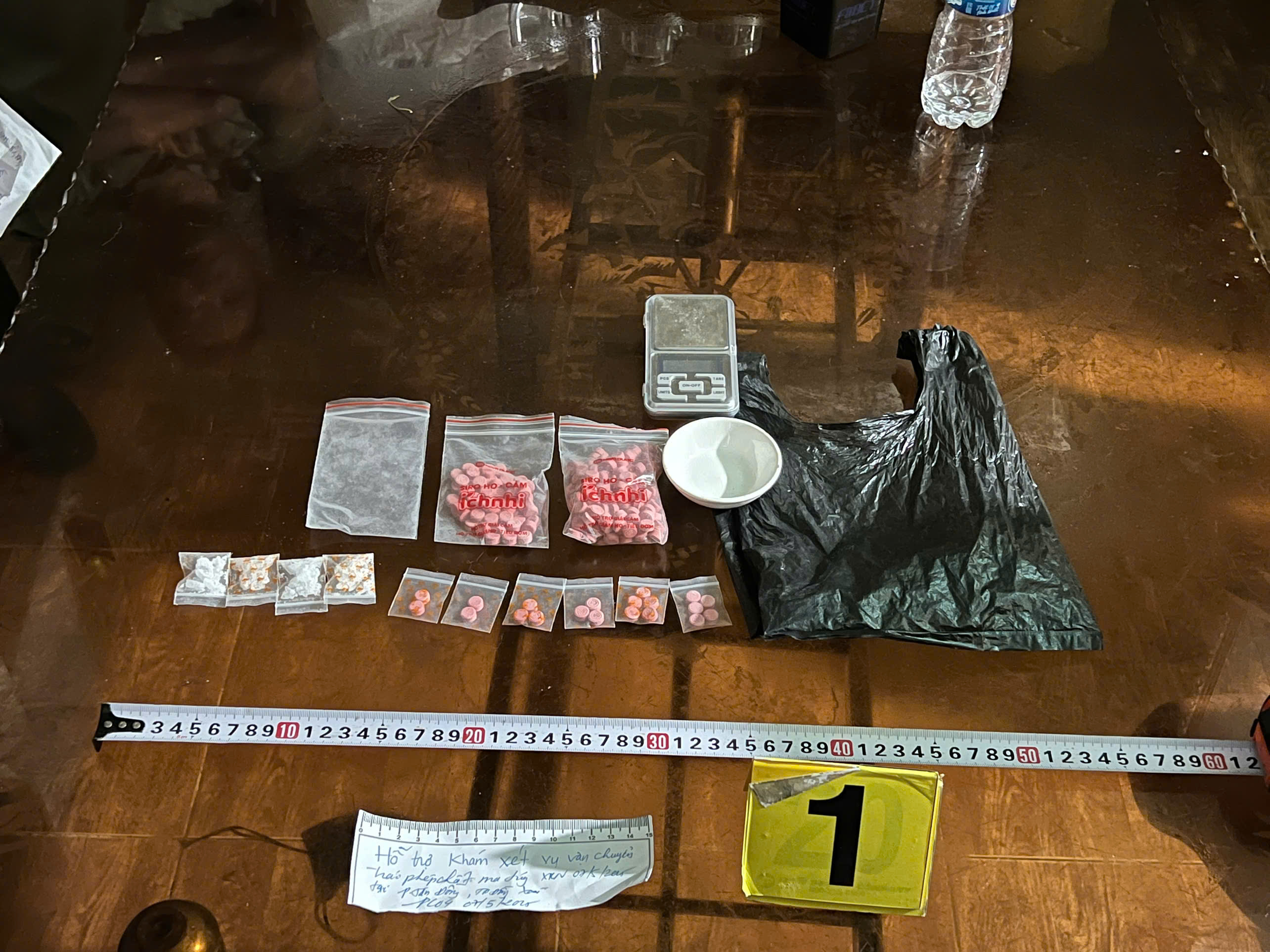 Triệt phá đường dây vận chuyển ma túy bằng xe khách, taxi với 22 kg tang vật - Ảnh 6.