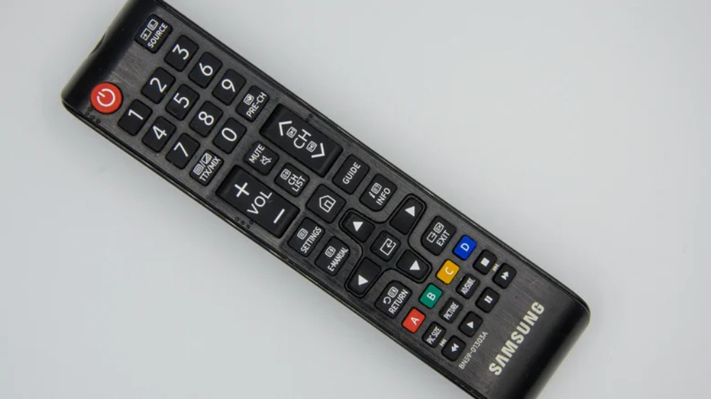 Giải mã vai trò 4 chấm màu bí ẩn trên điều khiển TV Samsung - Ảnh 1.