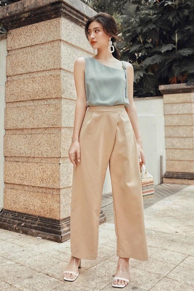 Quần tây, 'vũ khí' tôn dáng của quý cô hiện đại- Ảnh 6.