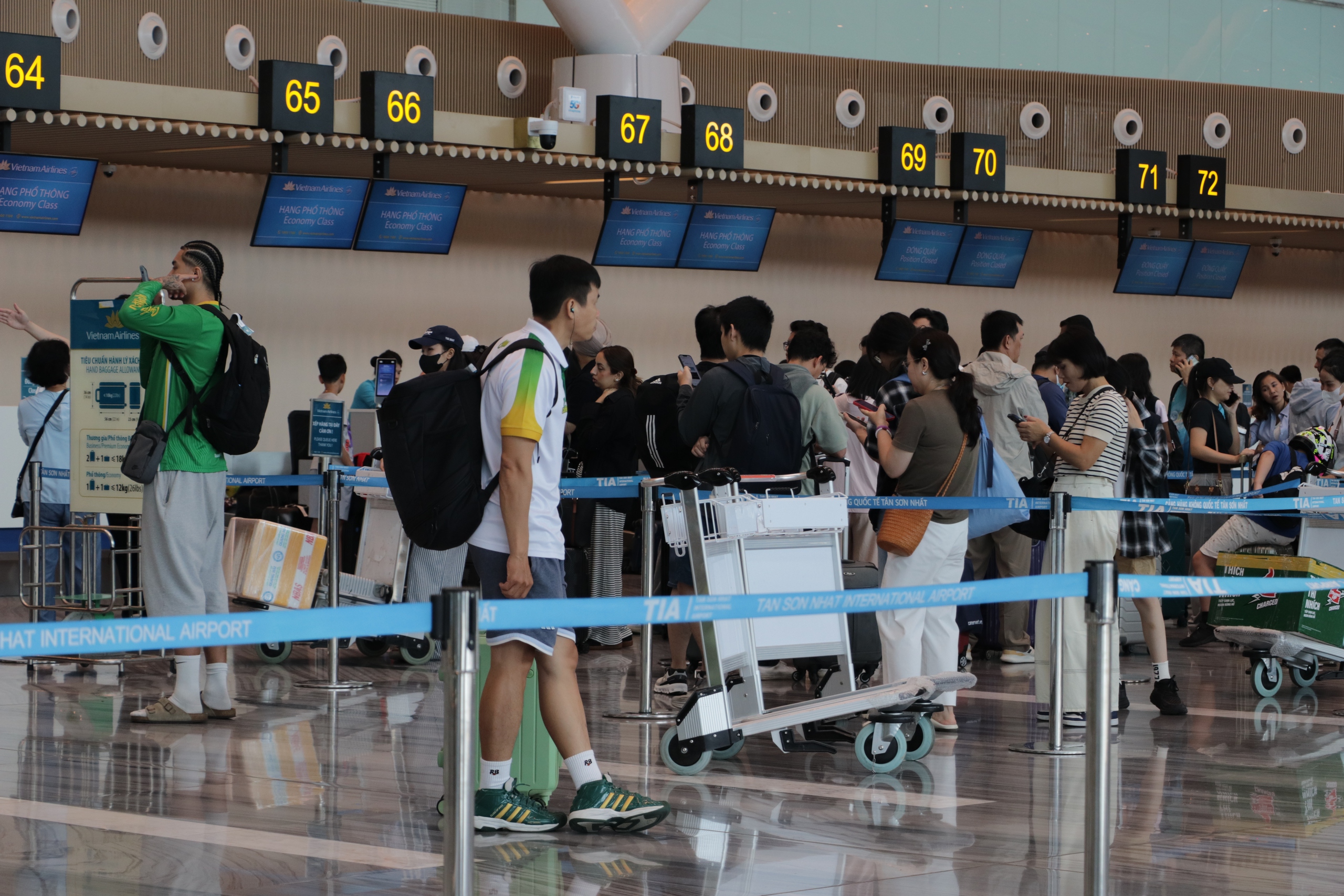 Đi máy bay bằng VNeID và sinh trắc học: 'Không sợ quên giấy tờ' - Ảnh 7.