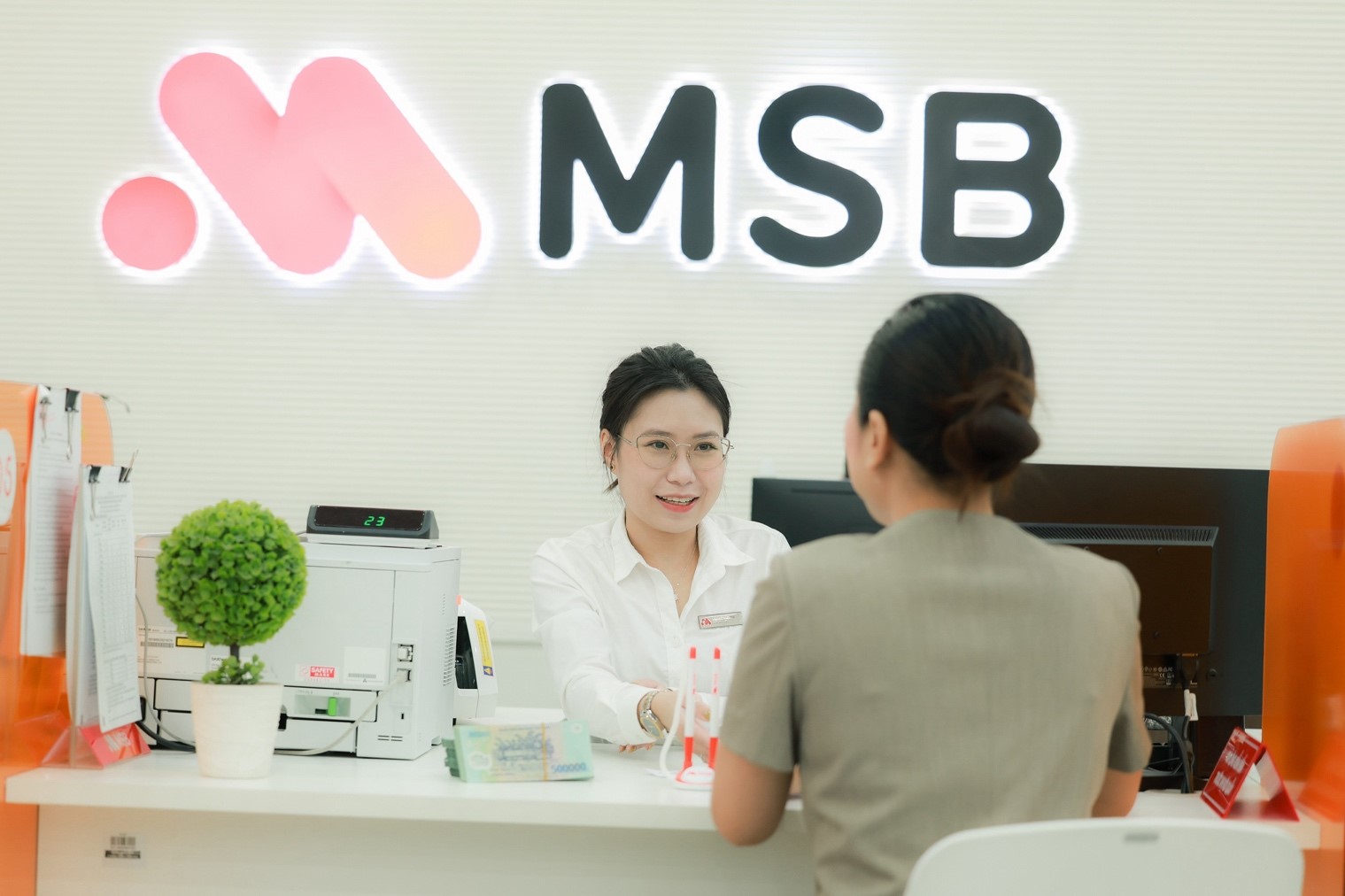 Doanh nghiệp tiết kiệm hàng chục triệu đồng mỗi tháng với gói tài khoản M-Smart - Ảnh 2.