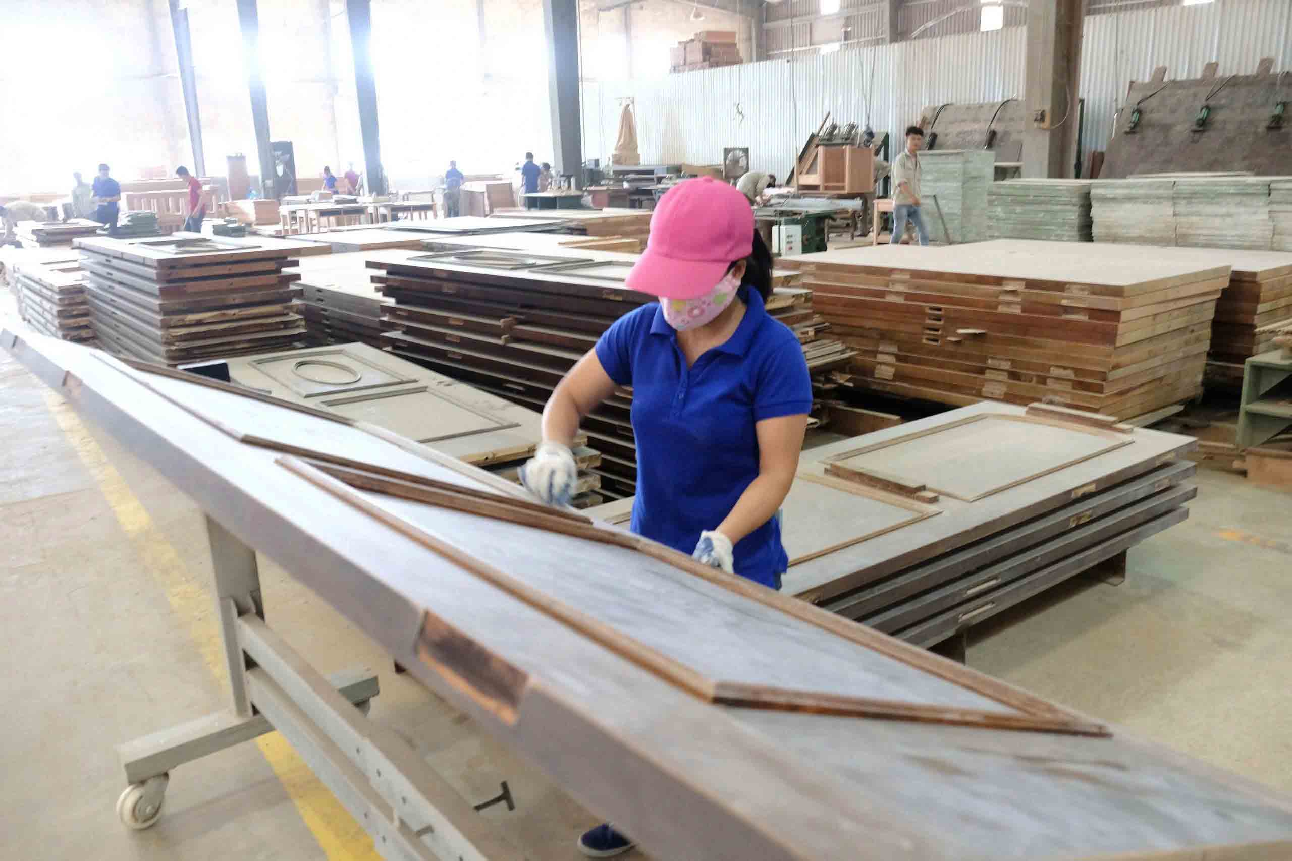 Doanh nghiệp gỗ lại thấp thỏm vì thuế - Ảnh 1.