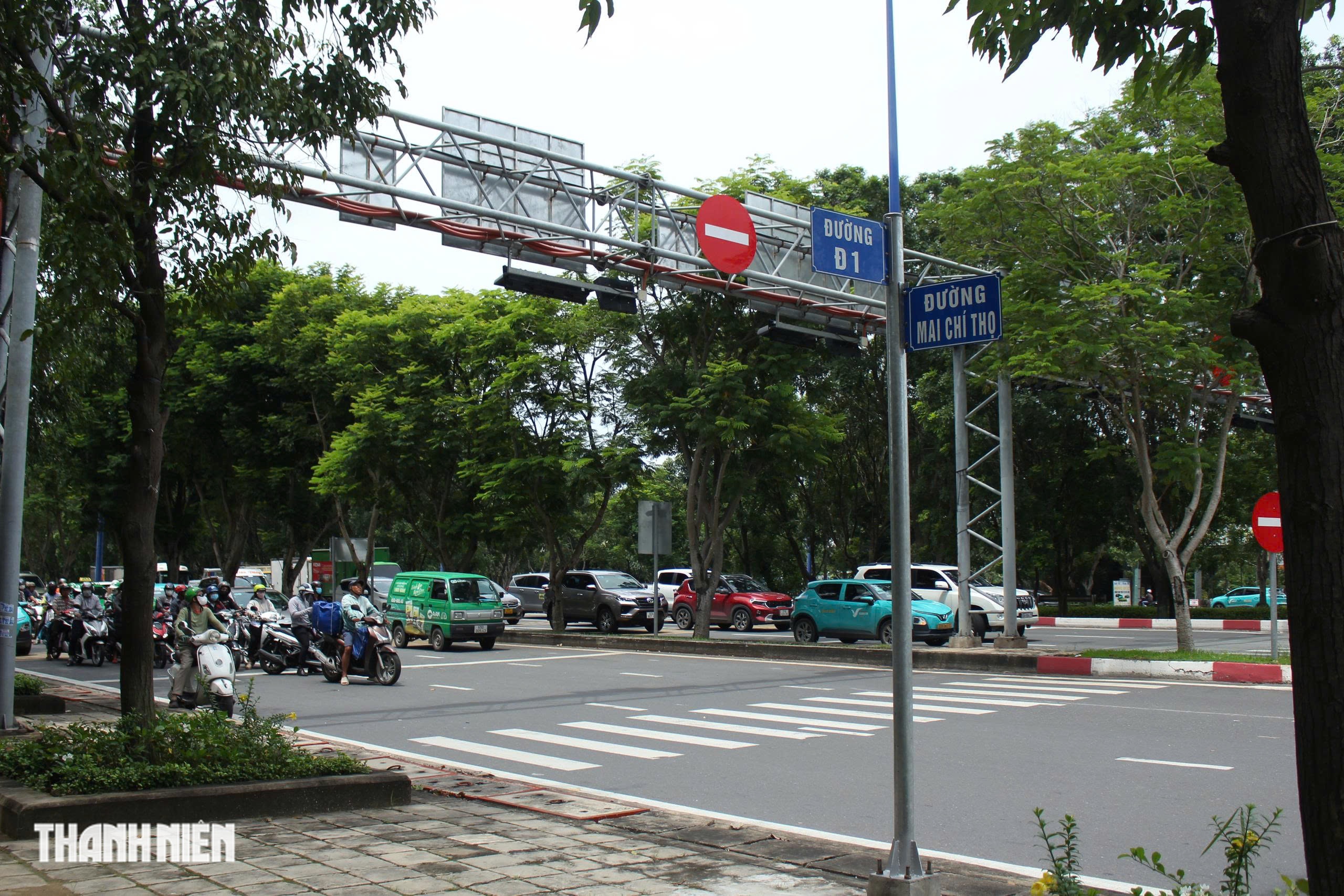 Cận cảnh đường c&oacute; l&agrave;n ri&ecirc;ng cho xe đạp ở TP.HCM: Rộng v&agrave; m&aacute;t mẻ - Ảnh 10.