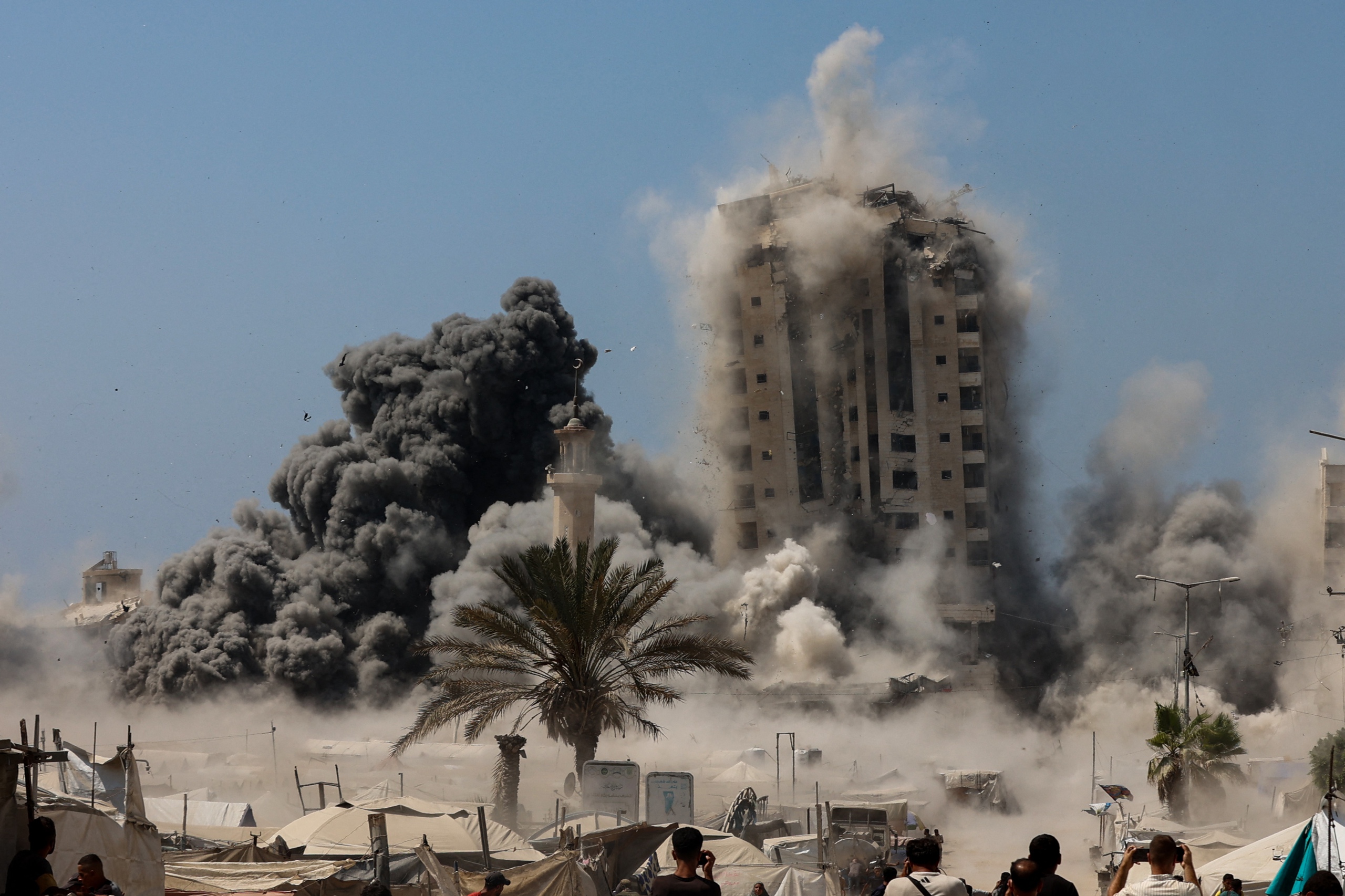 Israel tấn công tòa nhà ở Gaza giữa tình hình Dải Gaza căng thẳng gia tăng - Ảnh 1.