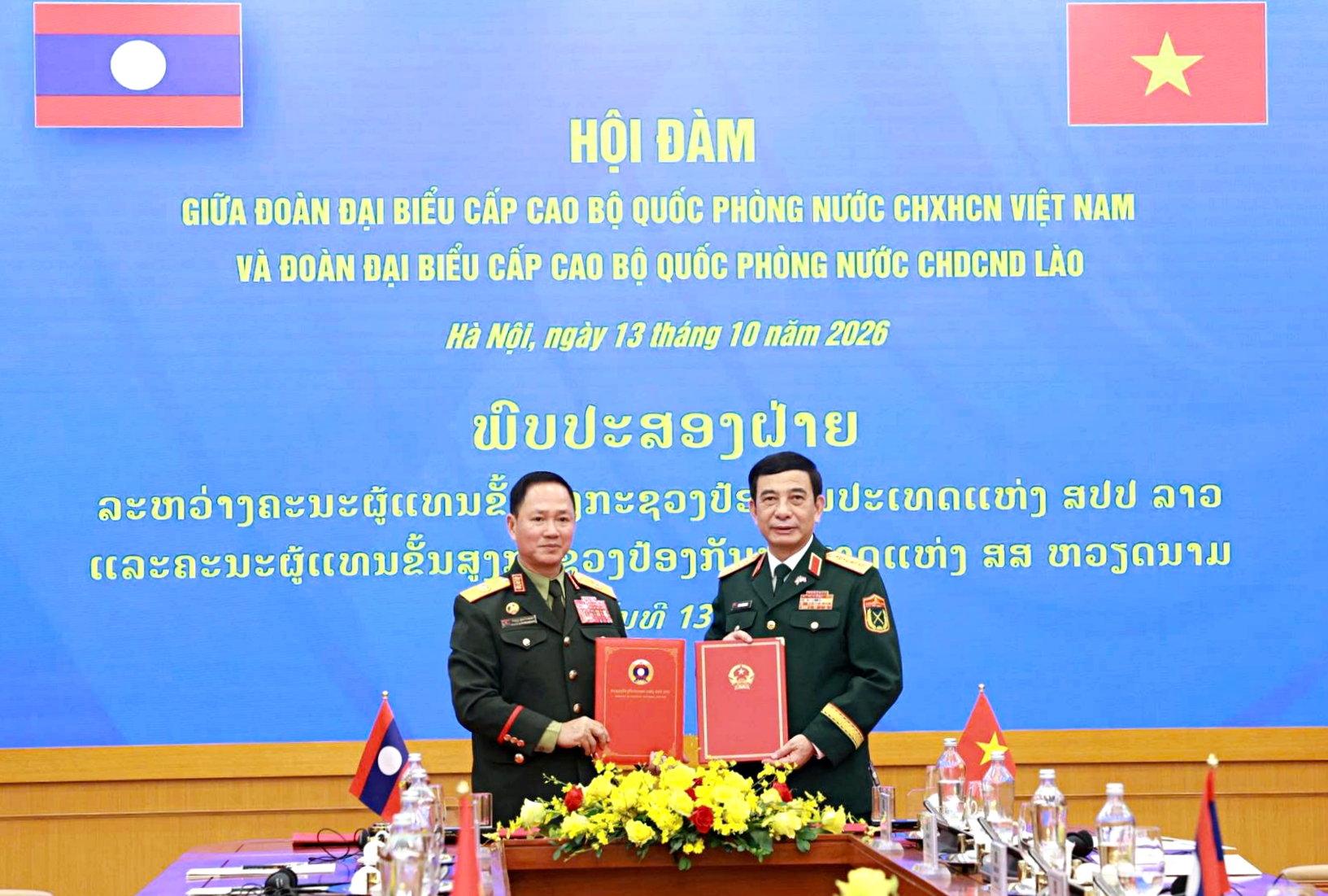 Đại tướng Phan Văn Giang và Bộ trưởng Quốc phòng Lào ký hợp tác quốc phòng 2027- Ảnh 1.