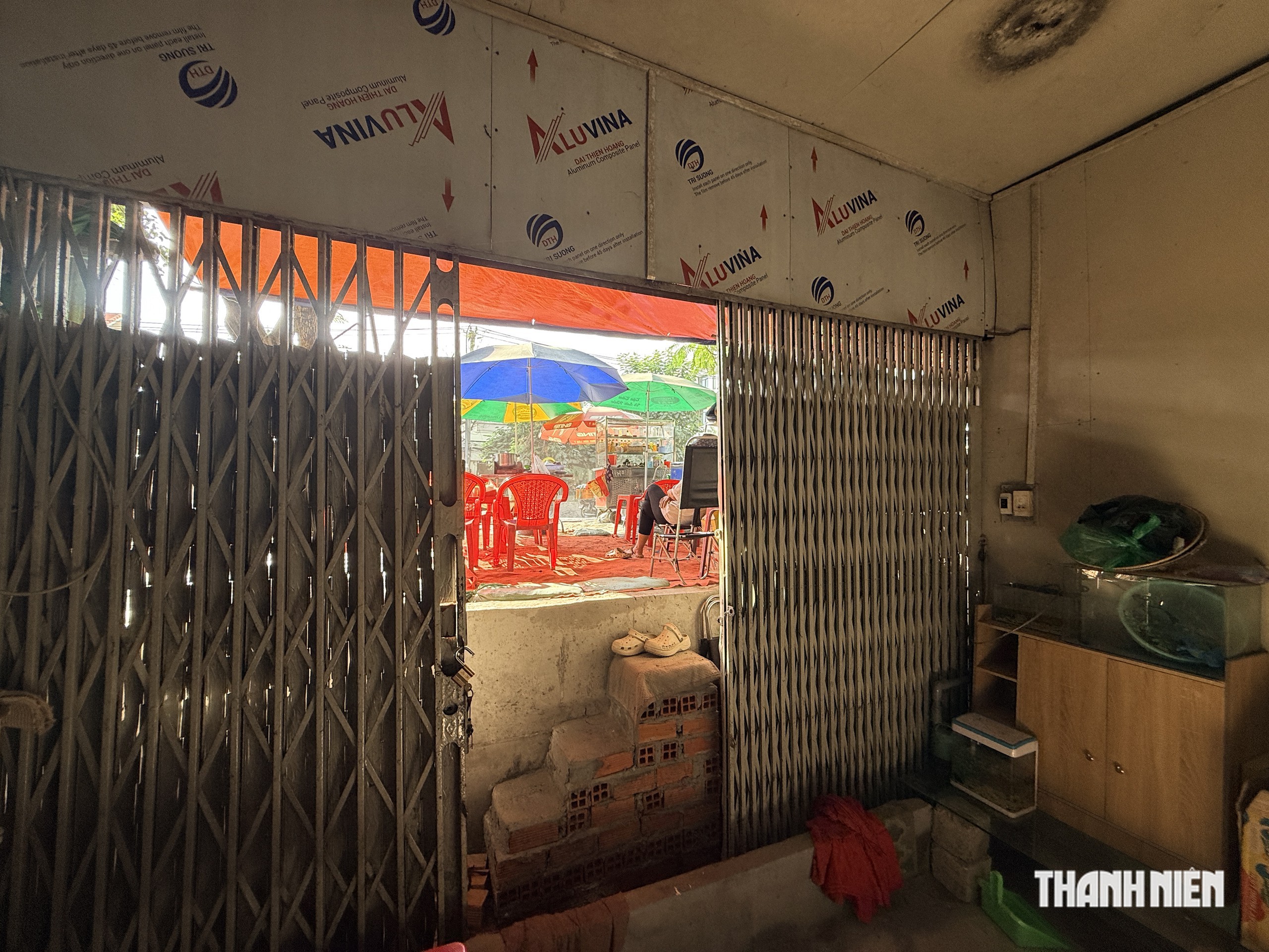 Đường Đặng Thùy Trâm ở TP.HCM nâng cấp, nhà dân bỗng thấp hơn mặt đường cả mét - Ảnh 10.