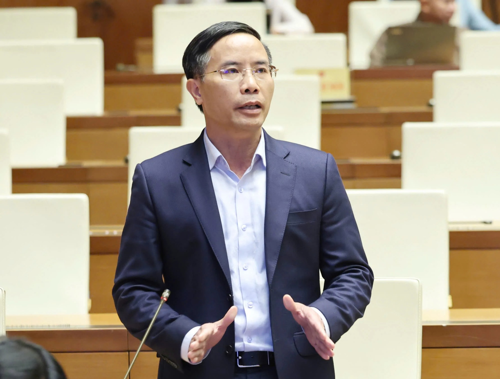 Thống đốc Phạm Đức Ấn nói về việc người dân ùn ùn gửi tiền vào ngân hàng - Ảnh 1.