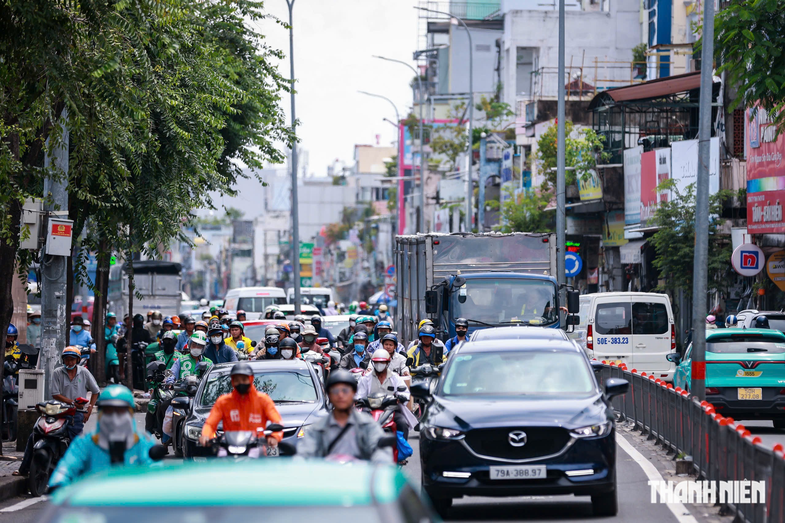 Vì sao đường Lý Thường Kiệt đông nghẹt xe buổi giữa trưa những ngày qua? - Ảnh 10.