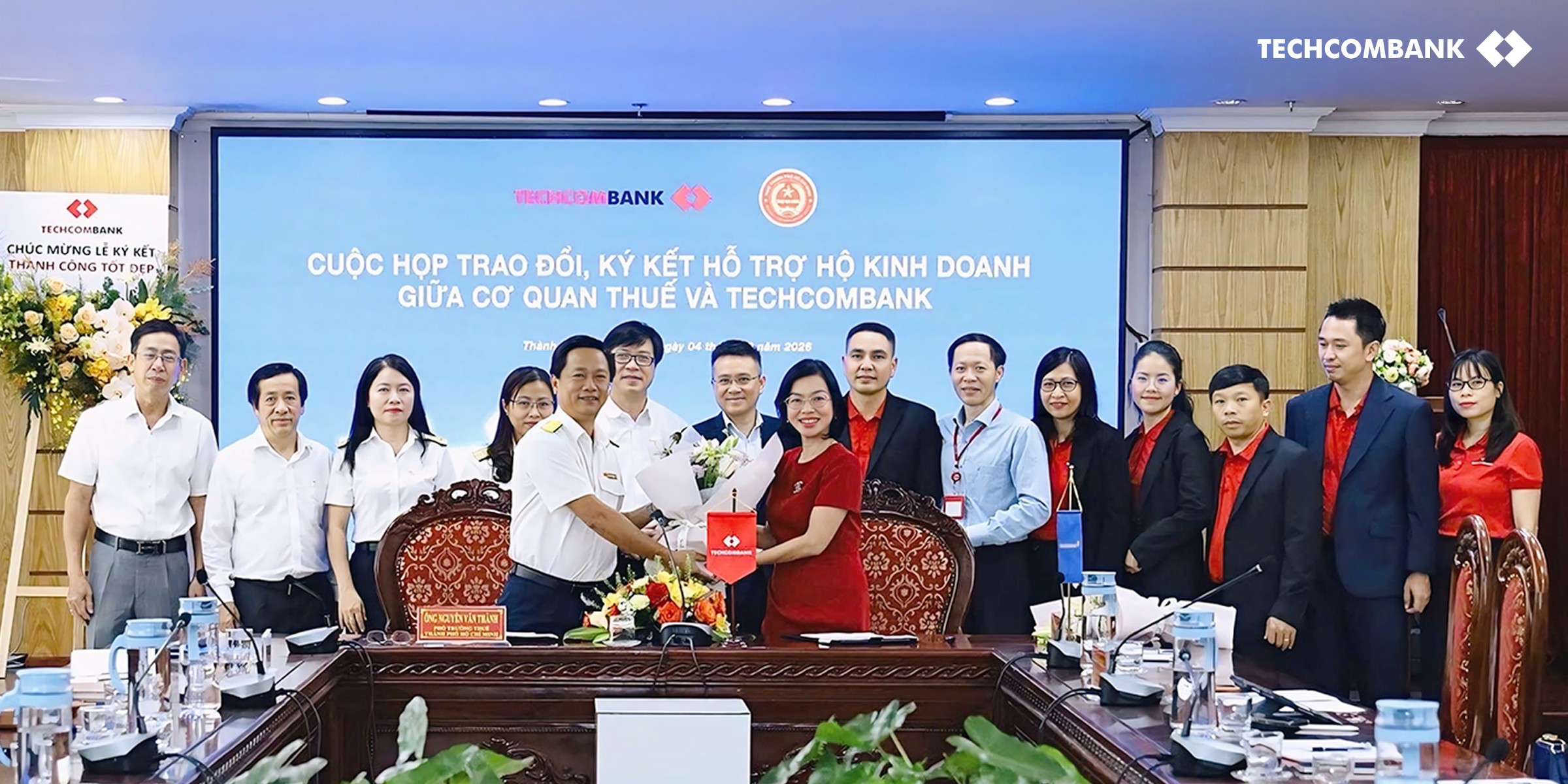 Techcombank và cơ quan thuế: Hỗ trợ hộ kinh doanh thanh toán không dùng tiền mặt- Ảnh 1.