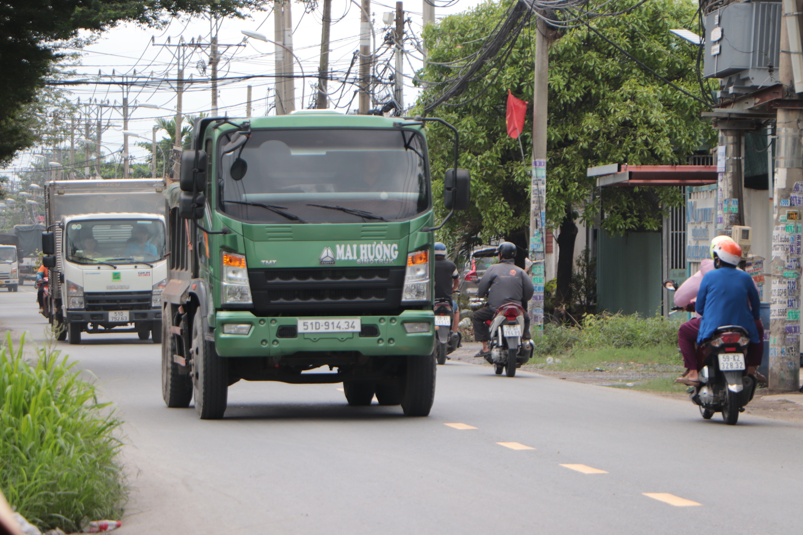 Đường Vĩnh Lộc sắp mở rộng 30m, người dân phấn khởi, hàng quán băn khoăn - Ảnh 3.