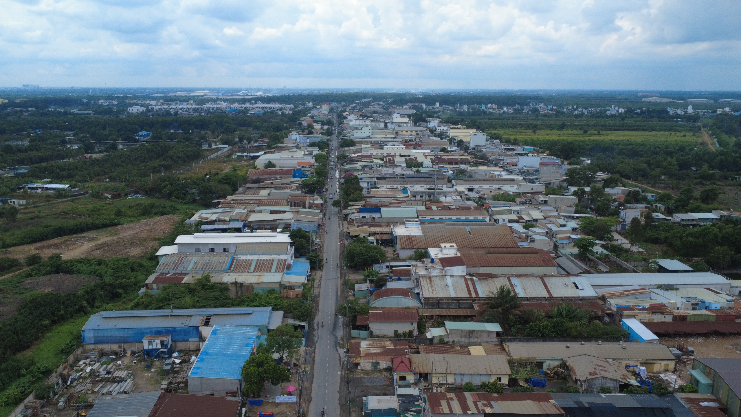 Đường Vĩnh Lộc sắp mở rộng 30m, người dân phấn khởi, hàng quán băn khoăn - Ảnh 2.