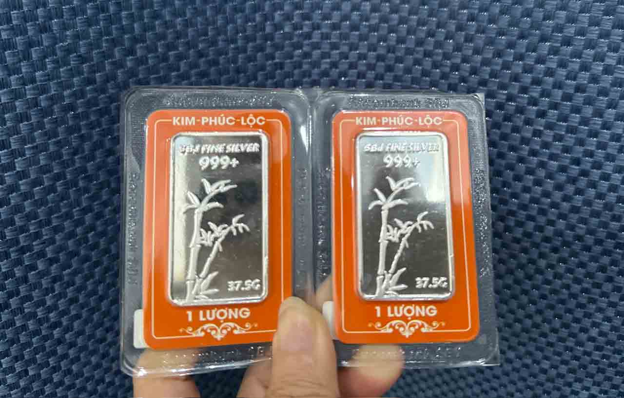 Người 'đu' theo bạc lỗ nặng- Ảnh 2.