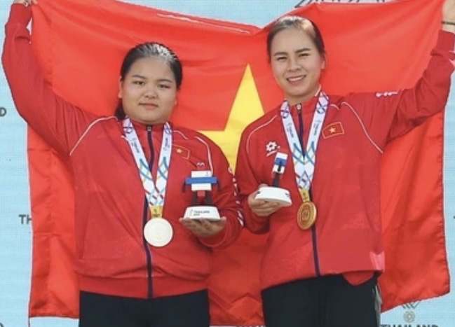 Xạ thủ Nguyễn Th&ugrave;y Trang đ&aacute;nh bại đương kim HCĐ Olympic, đoạt HCV bắn s&uacute;ng ch&acirc;u &Aacute;- Ảnh 1.