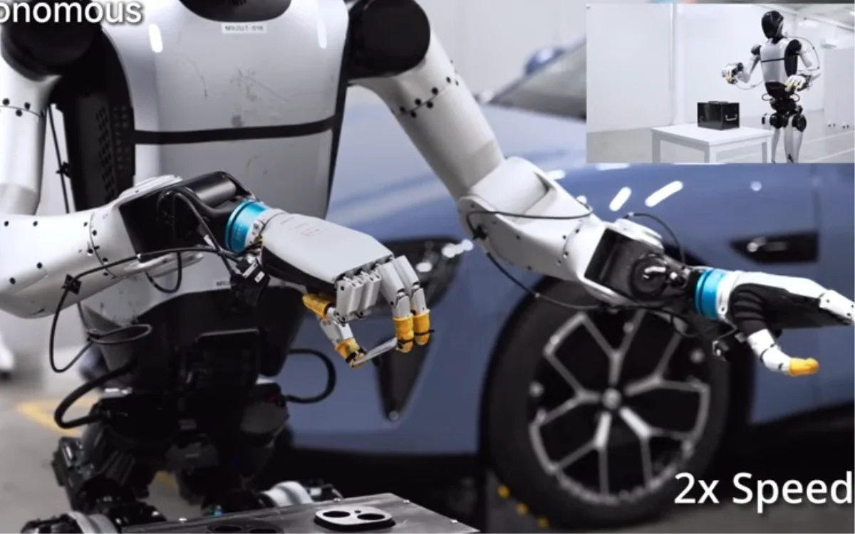 Robot 'thực tập sinh' của Xiaomi theo kịp dây chuyền xe điện 76 giây/chiếc - Ảnh 2.