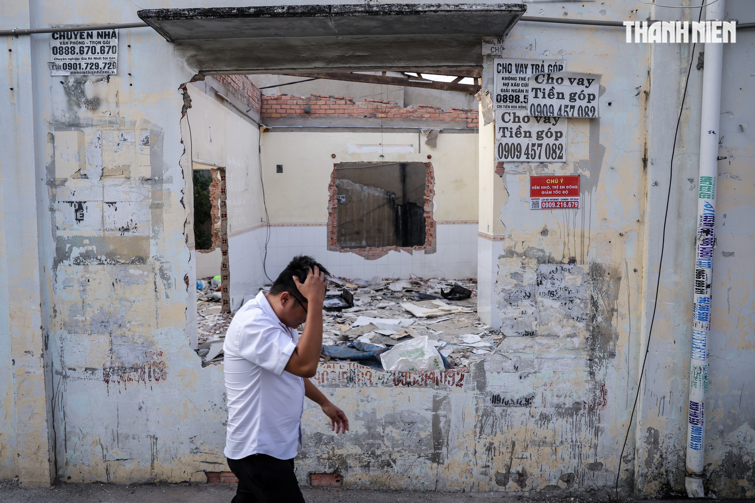 Người d&acirc;n TP.HCM dỡ nh&agrave;, nhường đất mở rộng quốc lộ 13 sau nhiều lần chậm trễ - Ảnh 5.