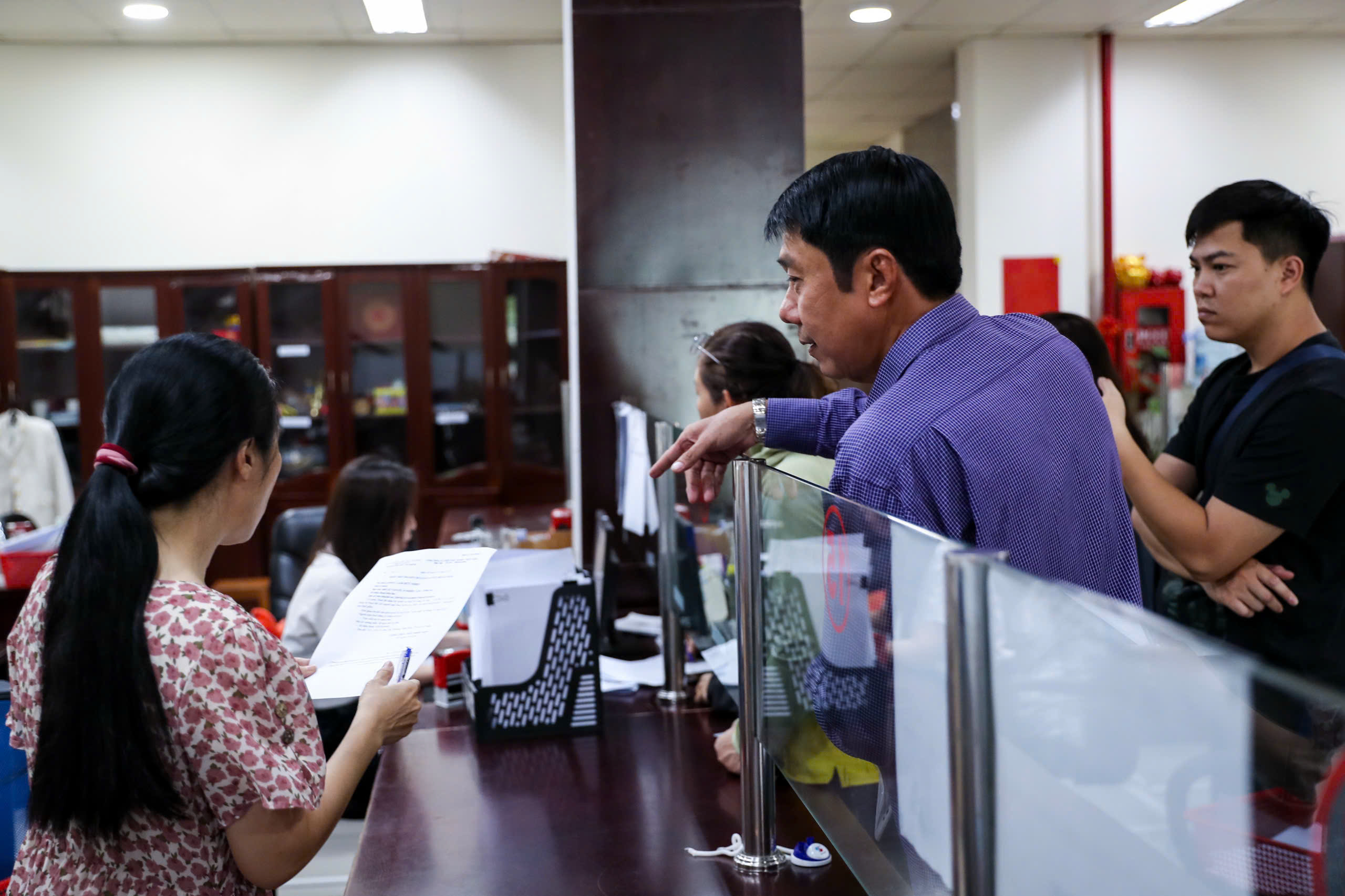 Doanh nghiệp nợ thuế, cá nhân chưa được hoàn - Ảnh 1.